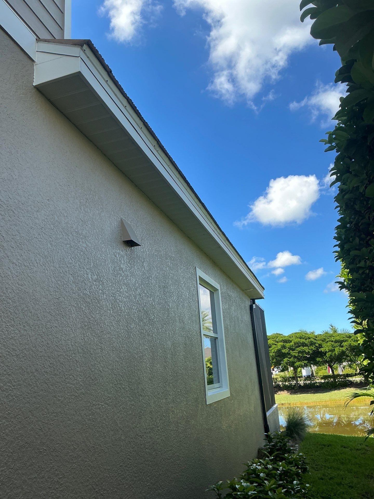 Bronze Downspouts & 7-Inch K-style Seamless Gutter Installation in Fort Myers FL by Gutter Professors