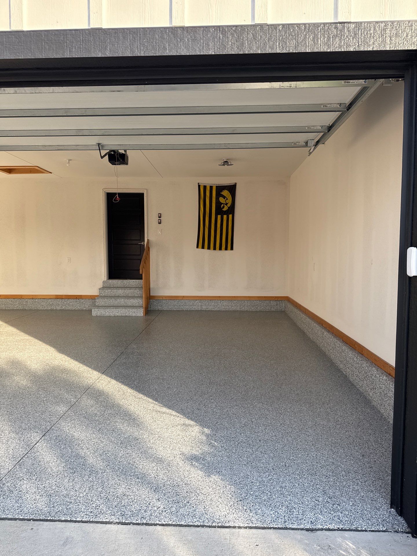 Beautiful Atmosphere to Watch the Hawkeyes! by Revival Concrete Coatings, LLC