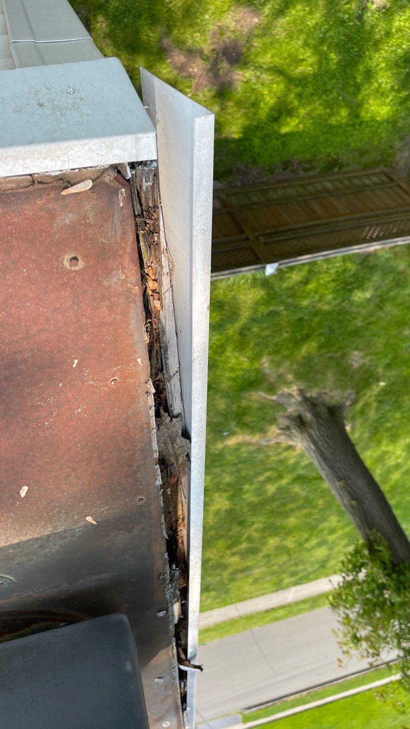 Gutter Cleaning Chimney top repair by A Plus Exterior