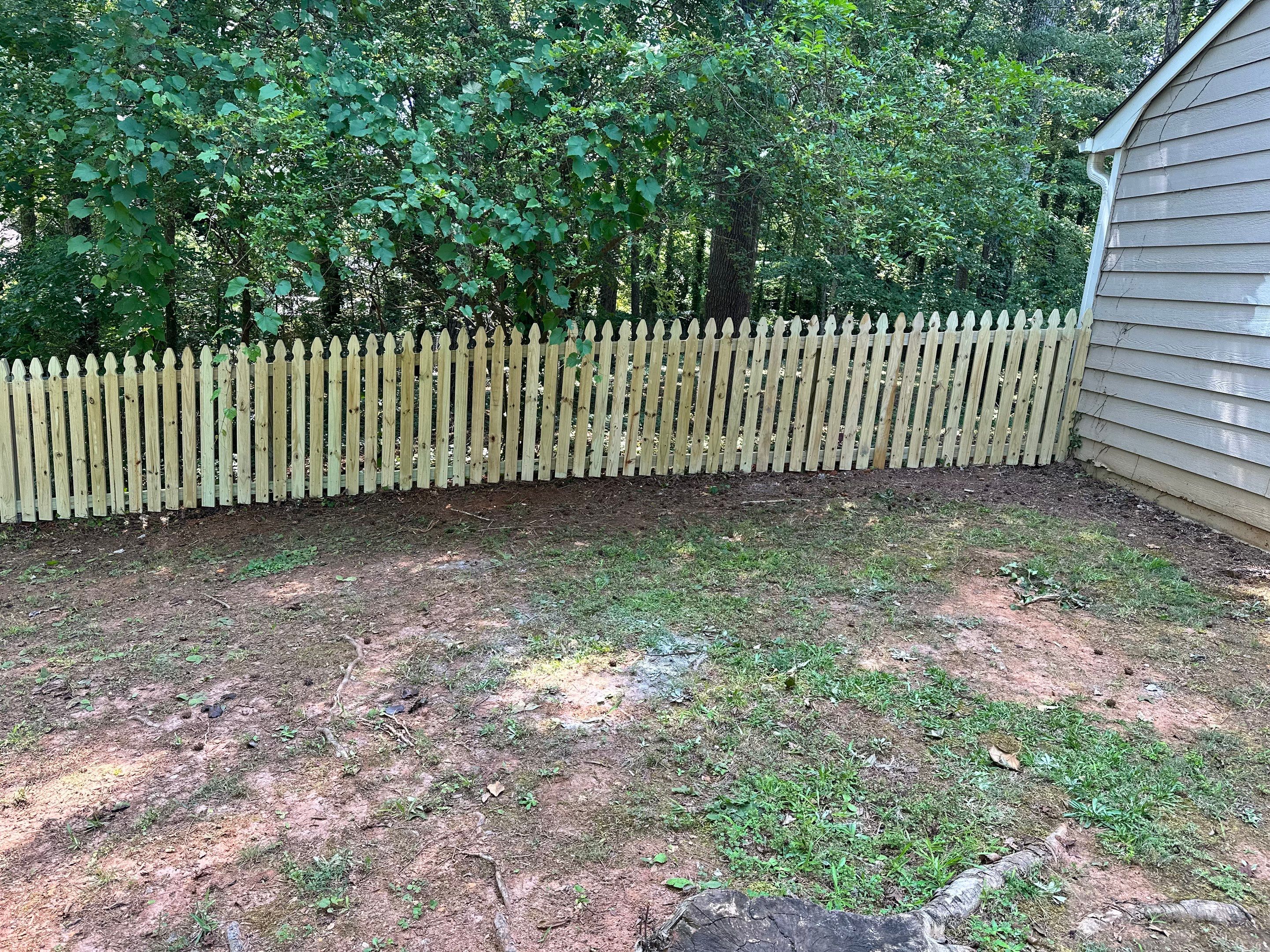 Exterior Siding Painting and Picket Fence Installation in Powder Springs by Swift Home Renovations