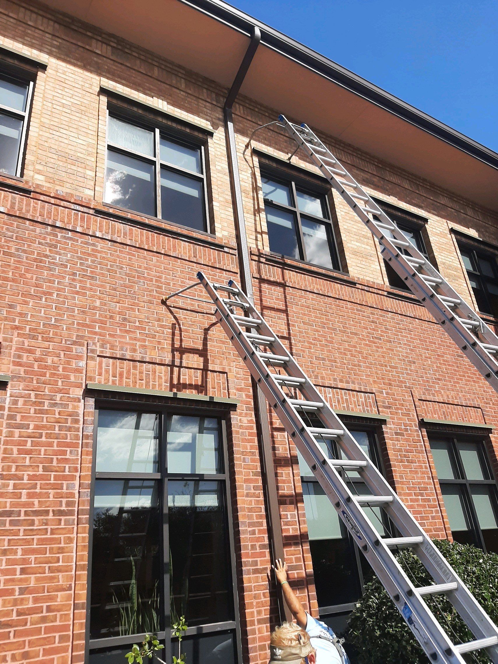 Pensacola Realtor Association Gutter Installation using K-Style White Gutters by Gutter Professors