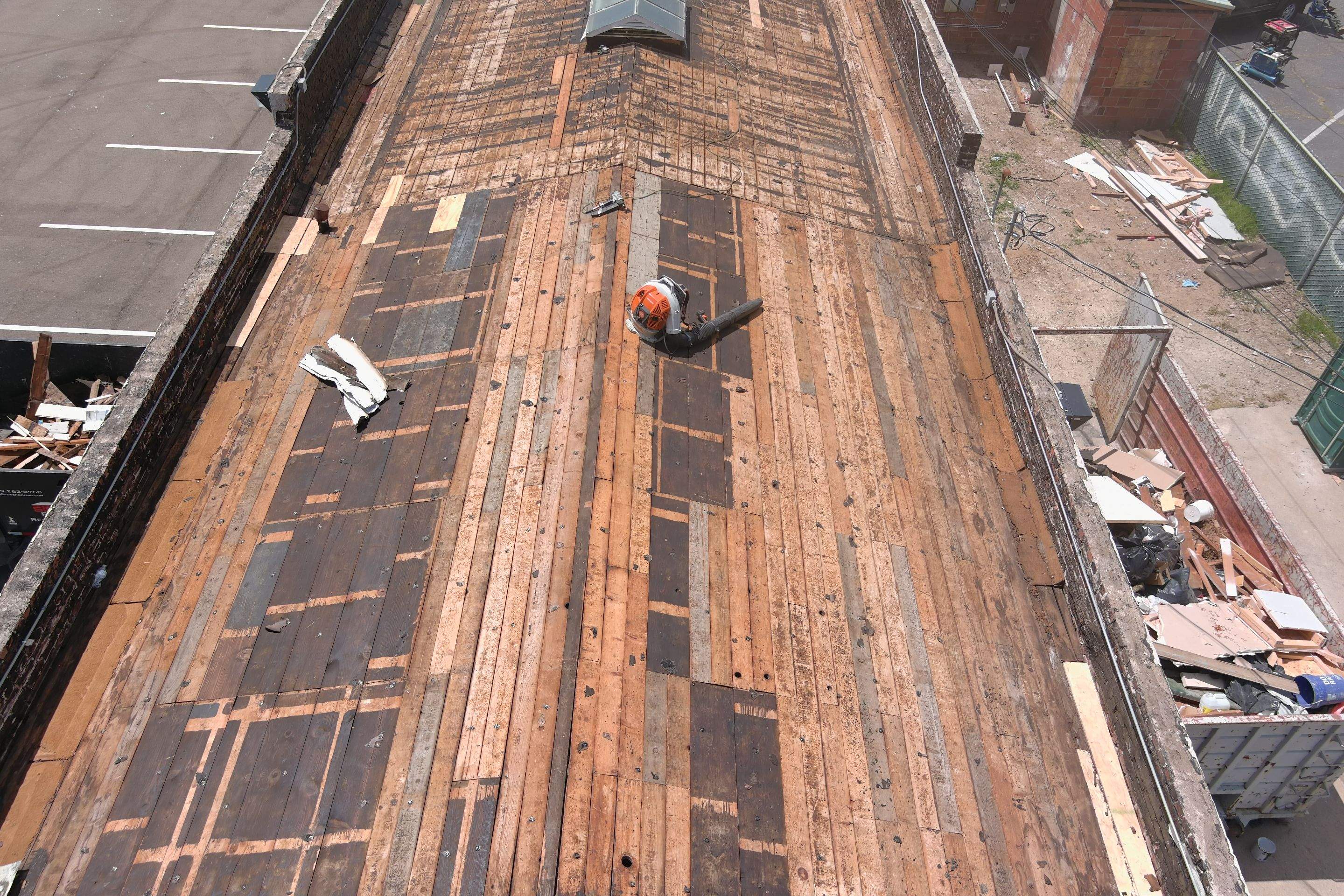 Commercial Roofing Installation using Conklin BenchPly system with PUMA top coat (imbedded fabric system) by Straight Edge Roofing Inc