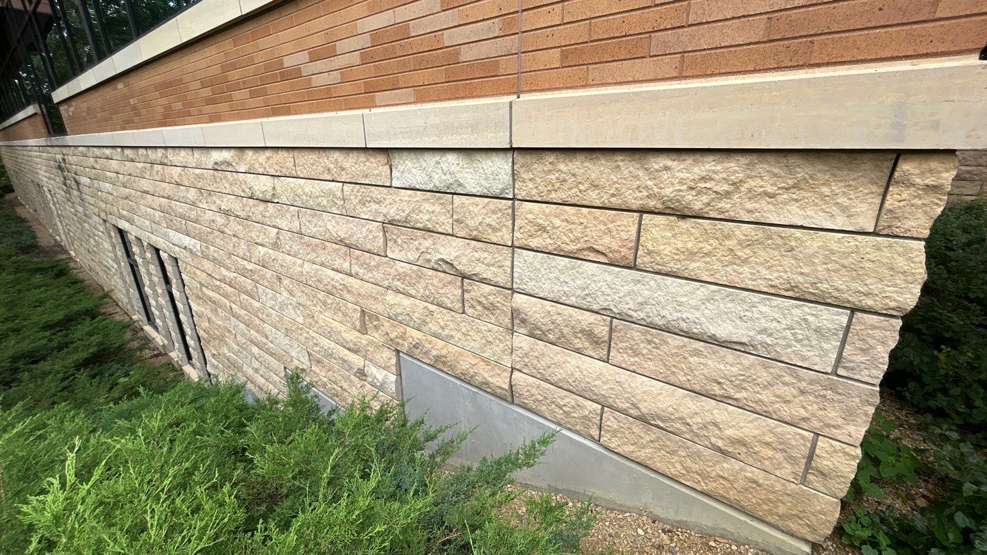 natural stone using Algaecide, soft wash soap by Northern Power Washing LLC.