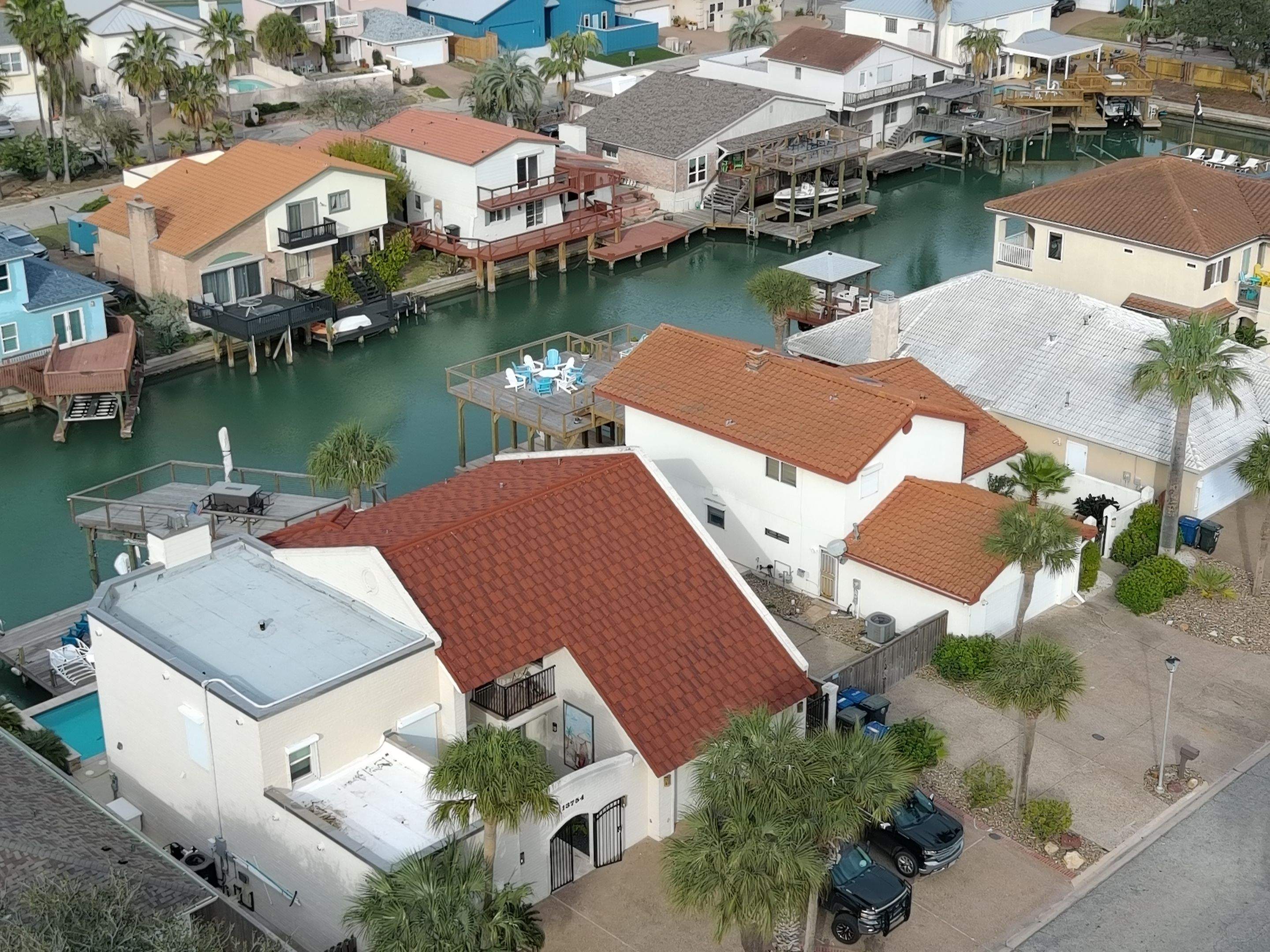 Off with the Tile and on with the TILCOR stone coated metal.  by Bayfront Roofing and Construction