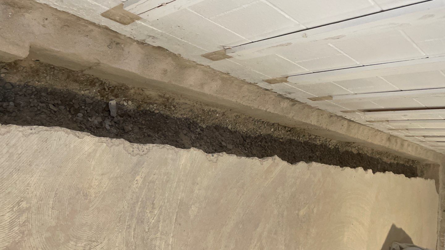 Interior Drain Tile & Buried Discharge in St. Anthony, MN by Waterproofing Northeast