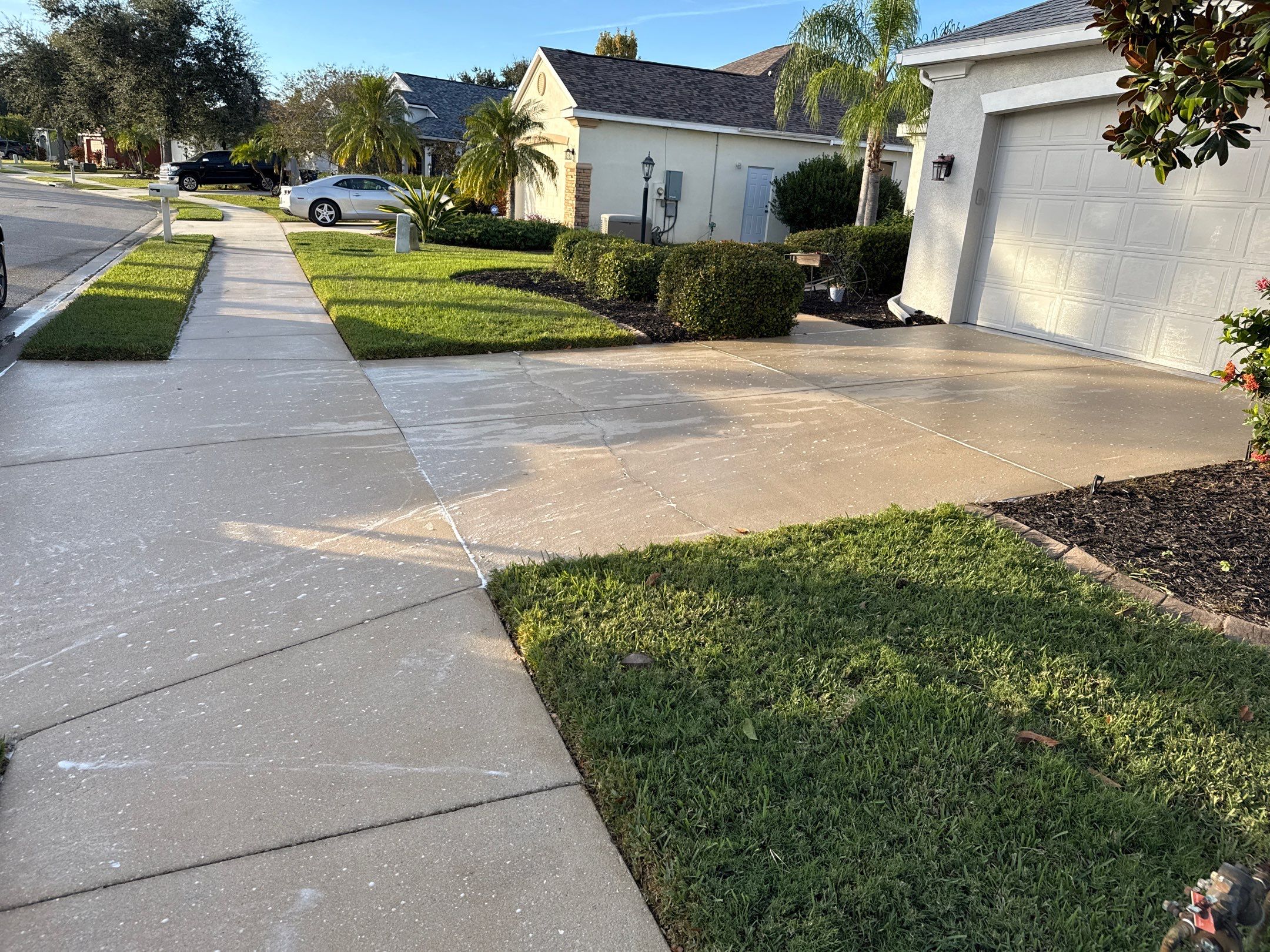 Concrete Driveway & Walkway Transformation | Northwood Park, Palmetto FL by Sunshine AquaWash