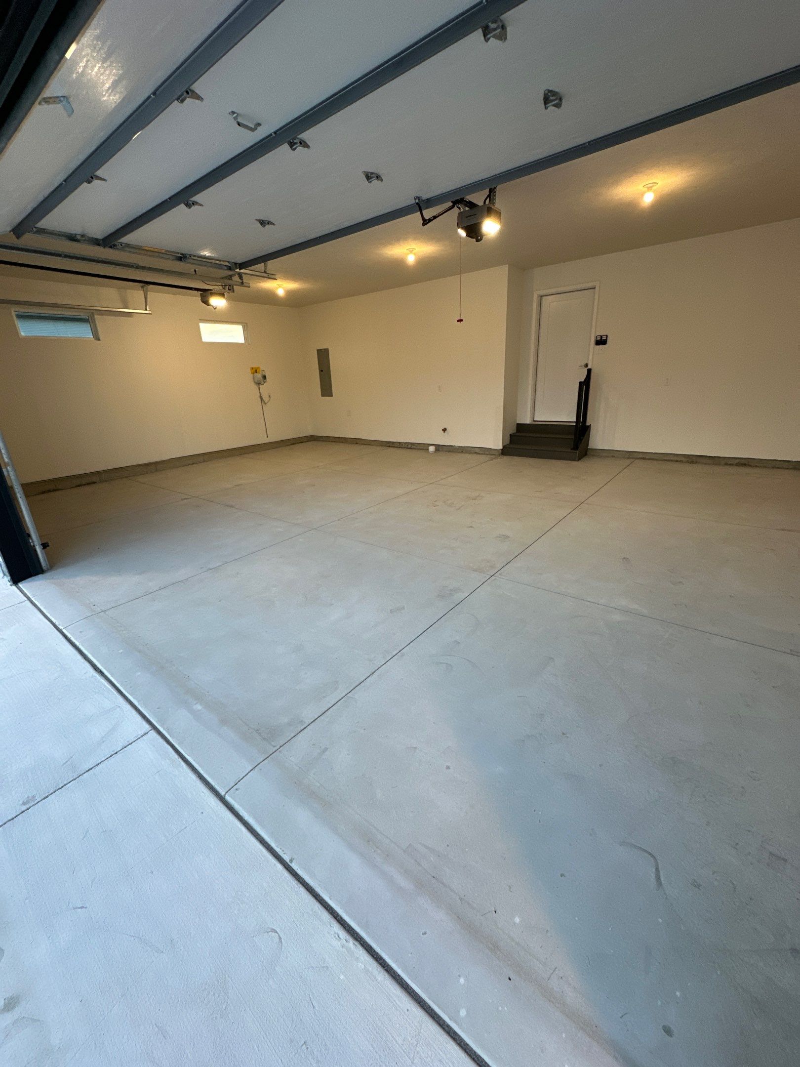 Black and White Speckled Epoxy Garage Floor in Lincoln by Goat Coatings