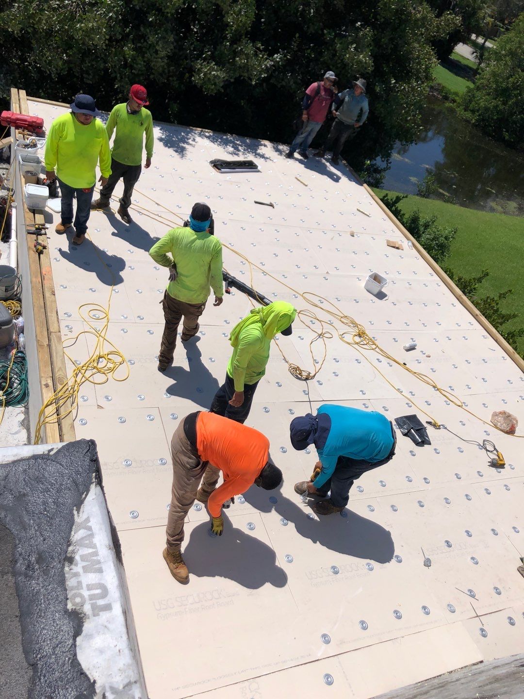 Amazing TPO flat deck re-roof with Eagle mansard in Hollywood Florida.  by First Due Roofing