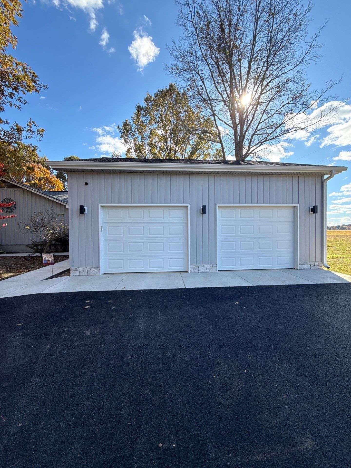 Sunroom and Garage Addition by Skilled Construction LLC