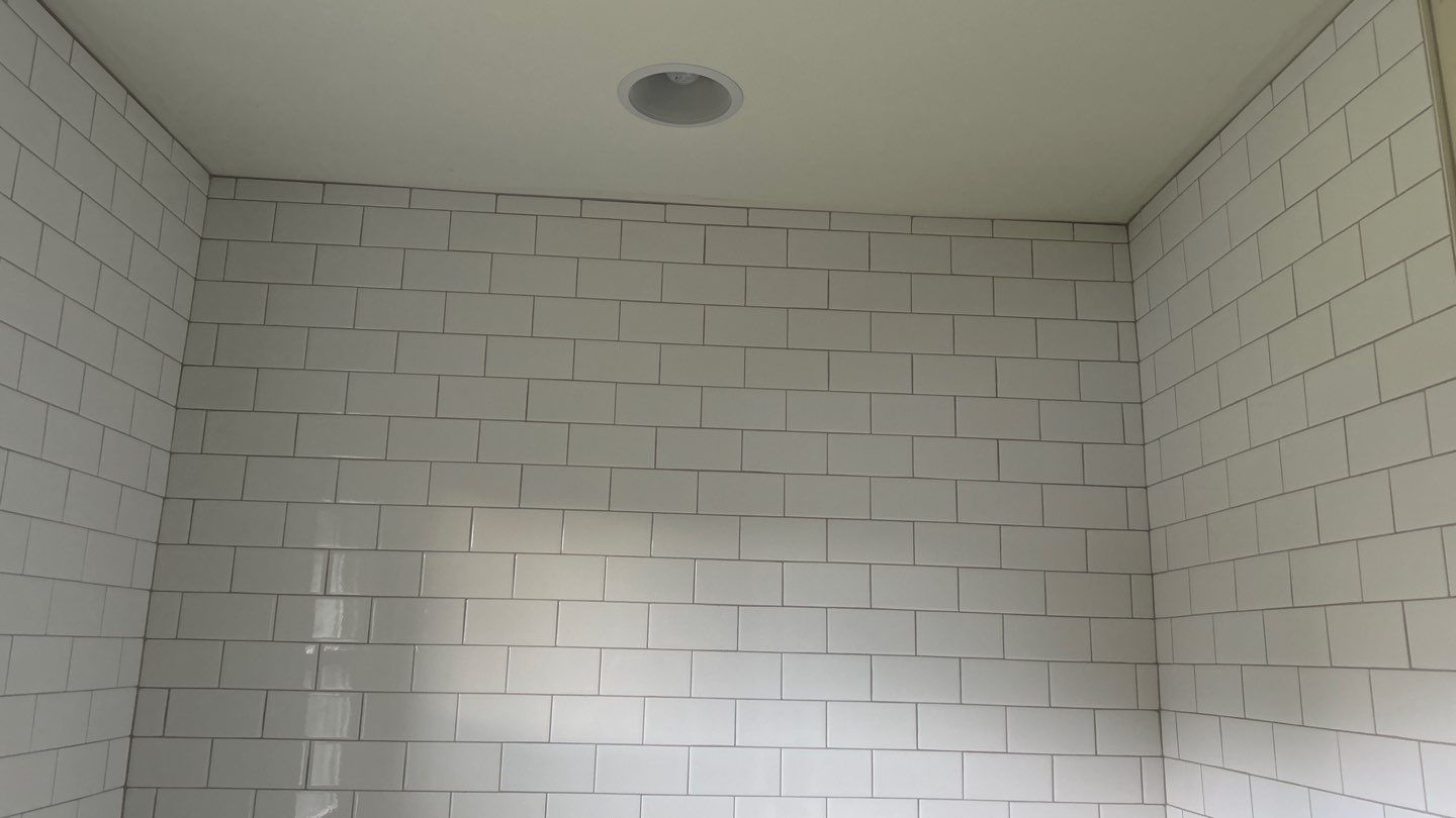 New Tub Surround  by Footprints Floors of Nashville