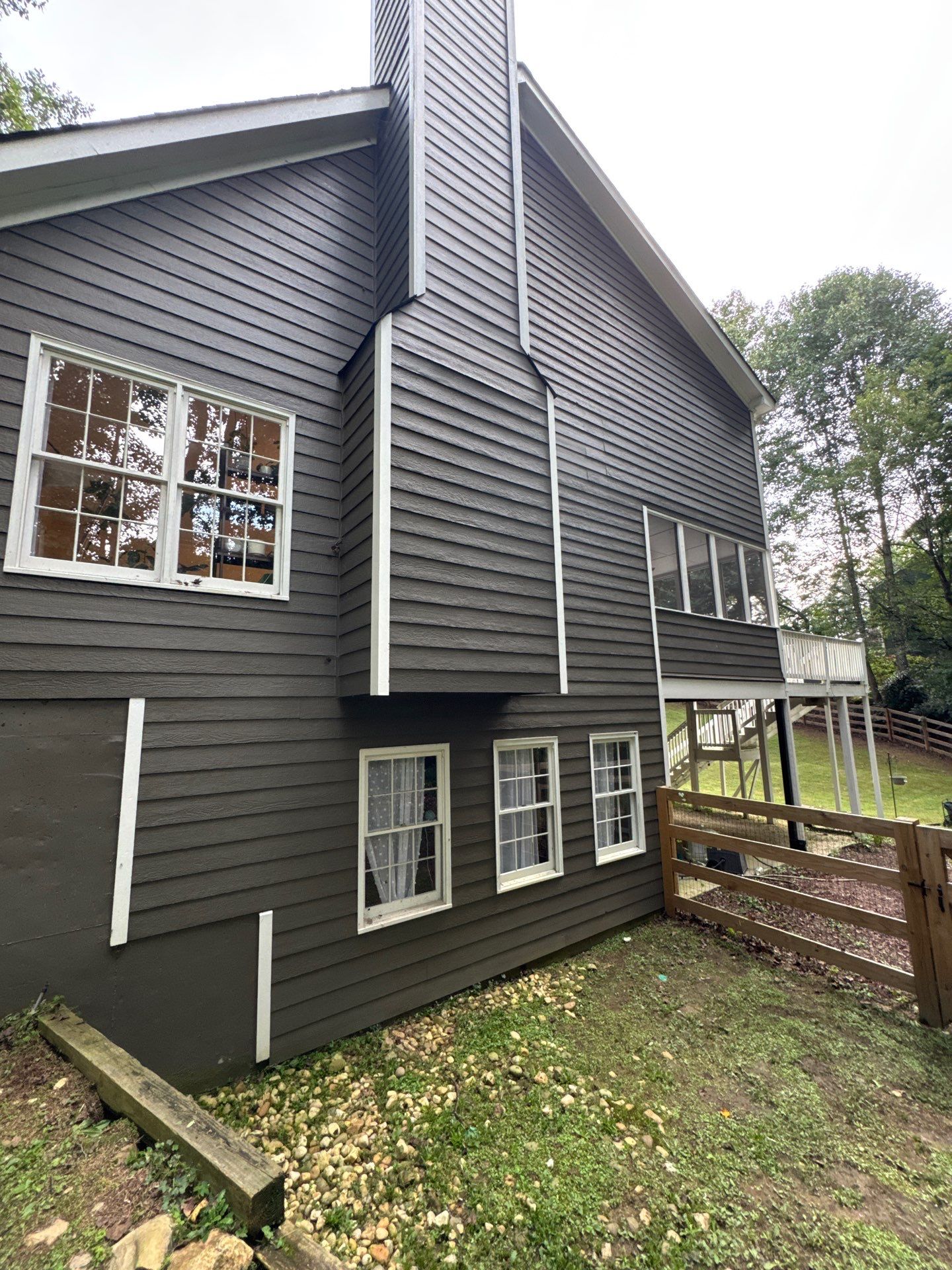 Marietta, GA Full Siding Replacement, 30+ Window Replacements, Screened-In Porch to Sunroom Conversion, Gutter Replacement, and Exterior Painting by Nelson Exteriors