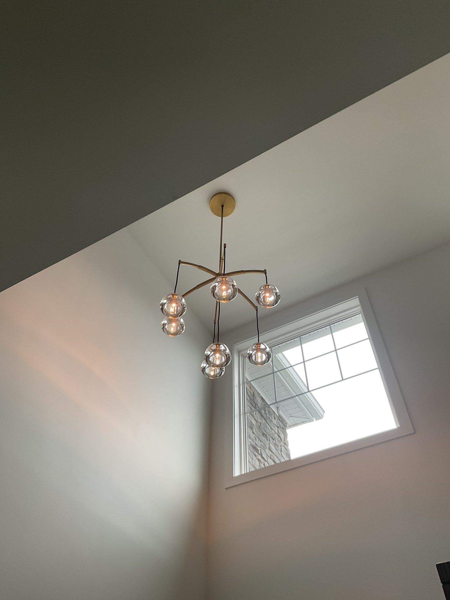 Luxury Fixture Installation in Foyer by ZAM Electric