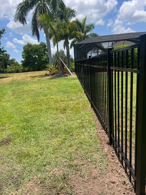 Aluminum Fence Installation using Black 3 Rail Aluminum Fence