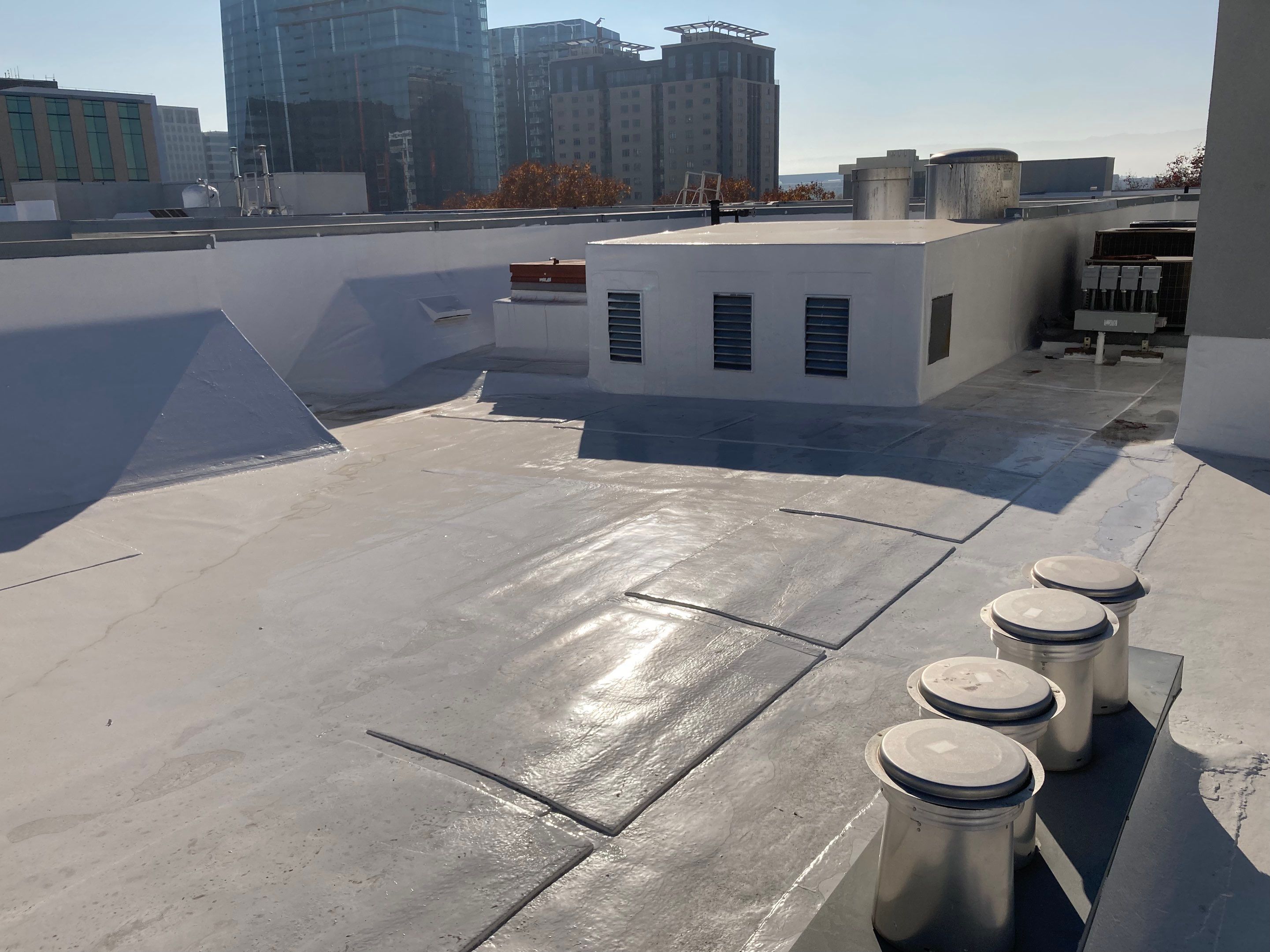 Commercial Flat Roof Repair and Reflective Silicon Coating in San Jose by Eastman Roofing & Waterproofing Inc.