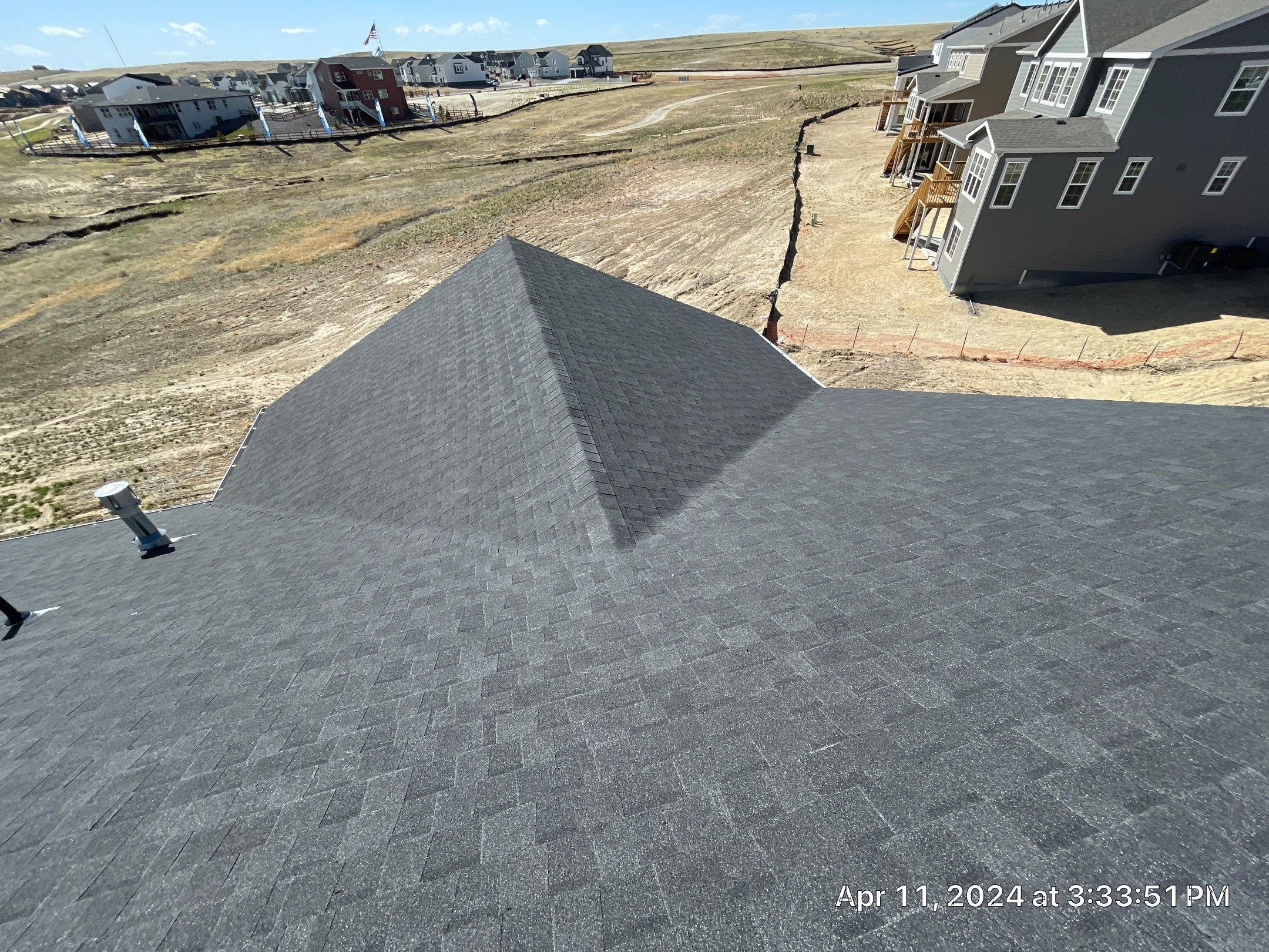 Residential Roofing Installation using Atlas Pinnacle Impact Black Shadow by Blue Peaks Roofing LLC 