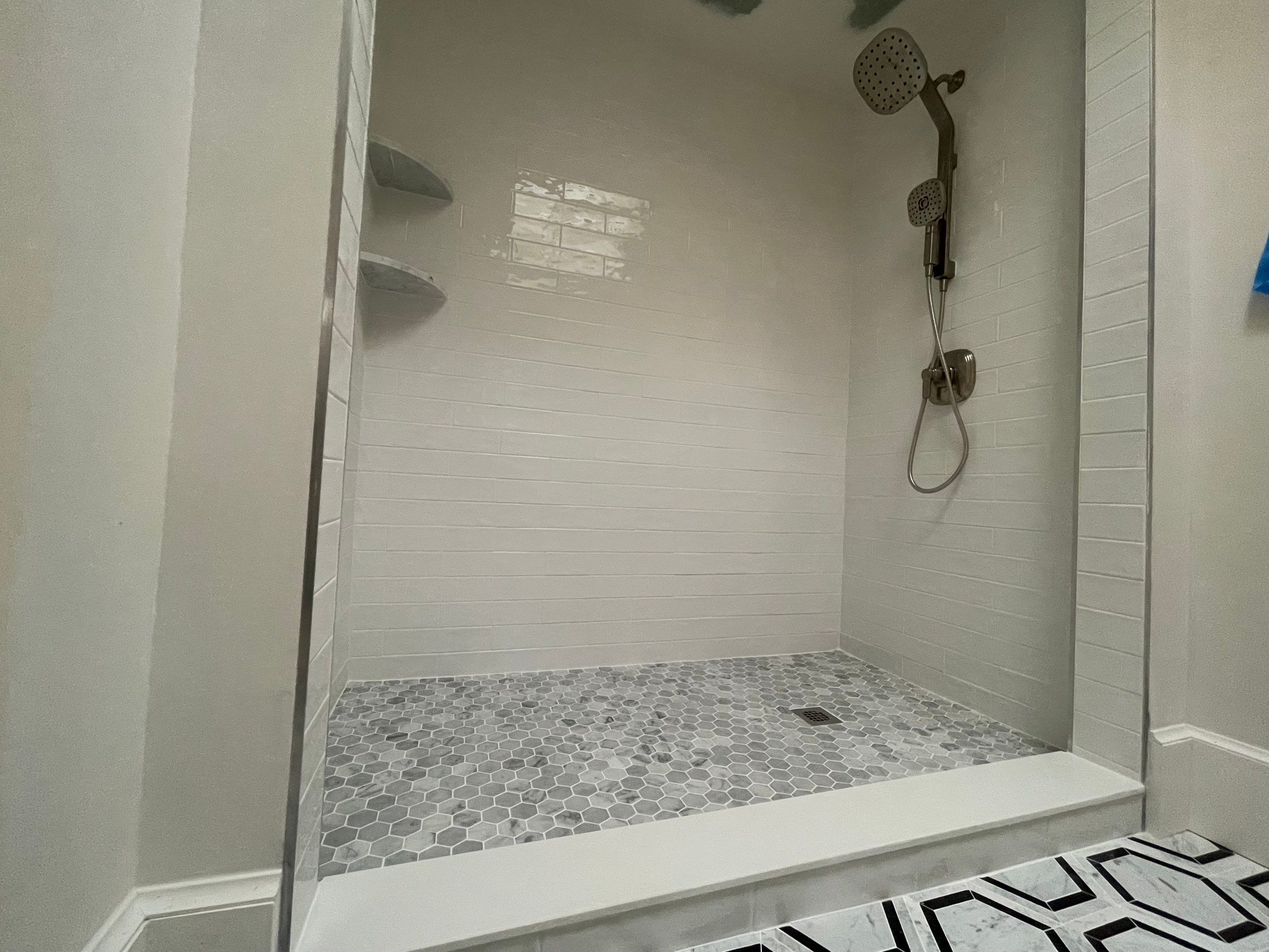 Bathroom Remodel using Tile by Home Concepts Construction