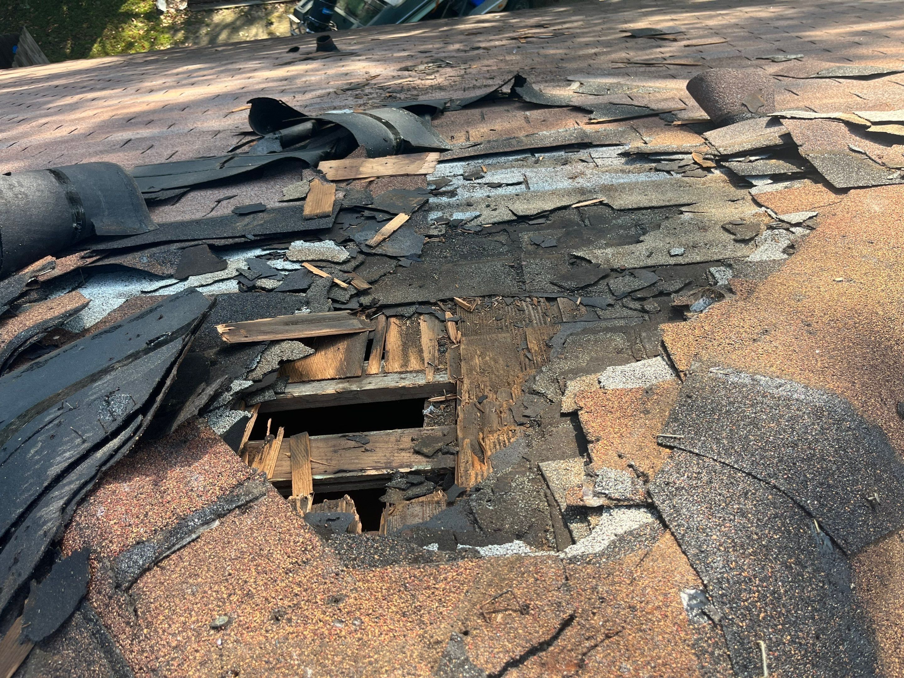 Residential Metal Roof Replacement using Reed's Metals: Colored Residental Panel (Burgundy) by Hostetler Roofing