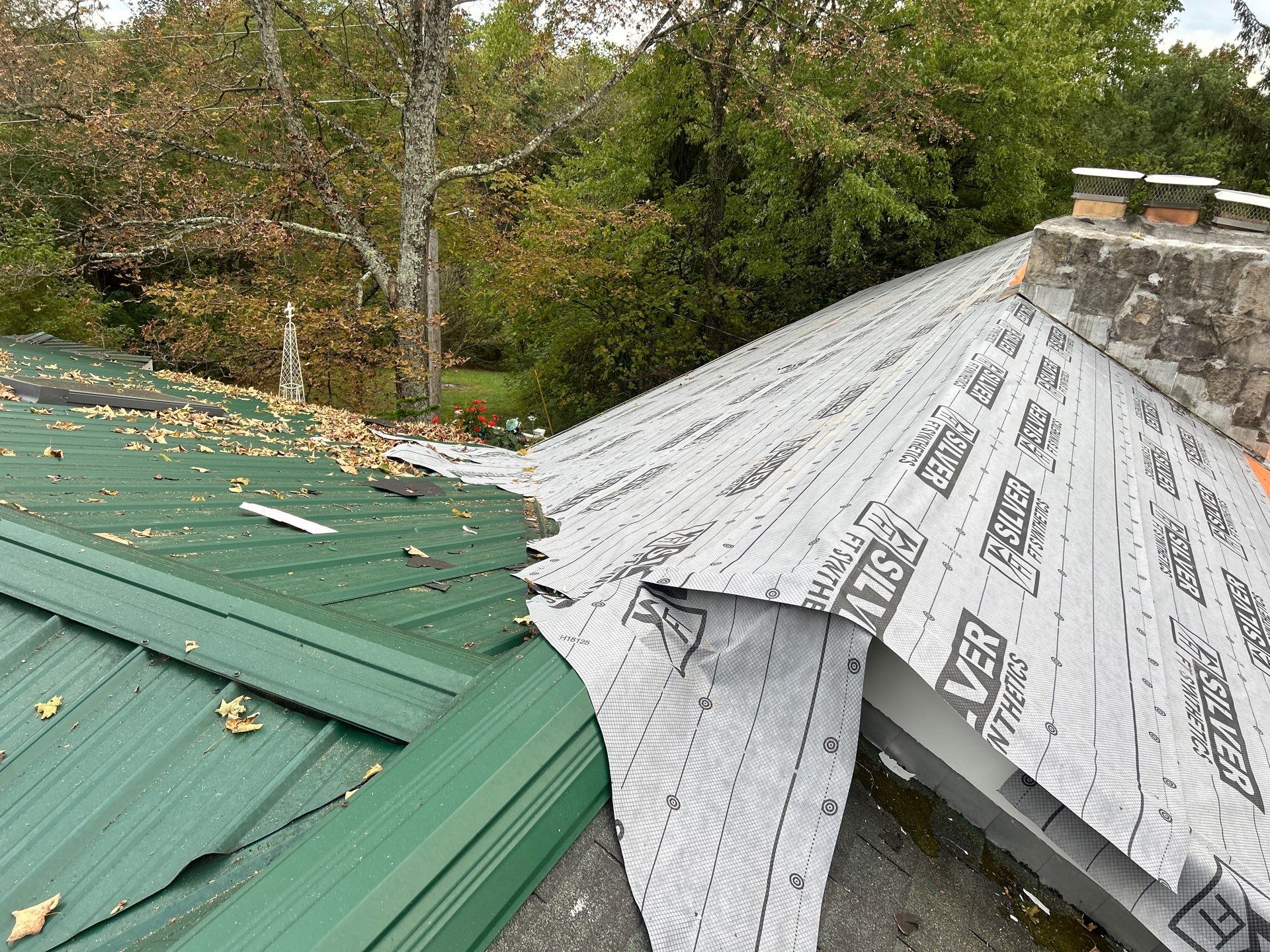 Residential Roofing Installation using Metal by Rainstoppers Roofing
