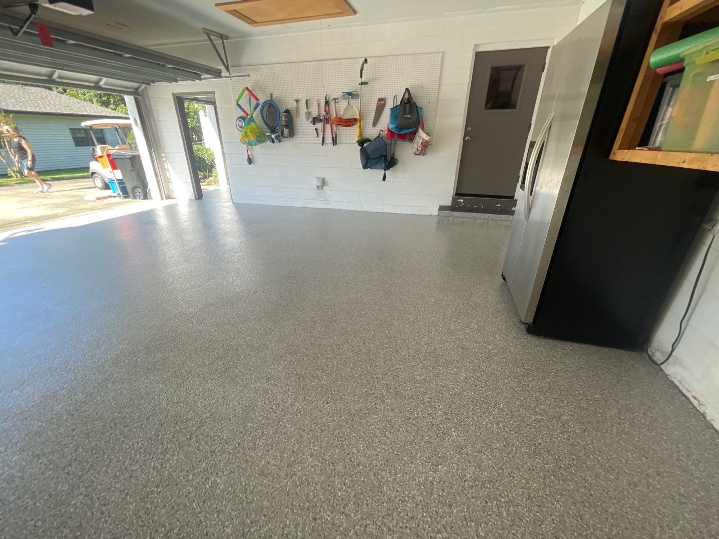 Garage with Cabinets in Gainesville, FL in Mount Everest by Cross Creek Concrete Coatings