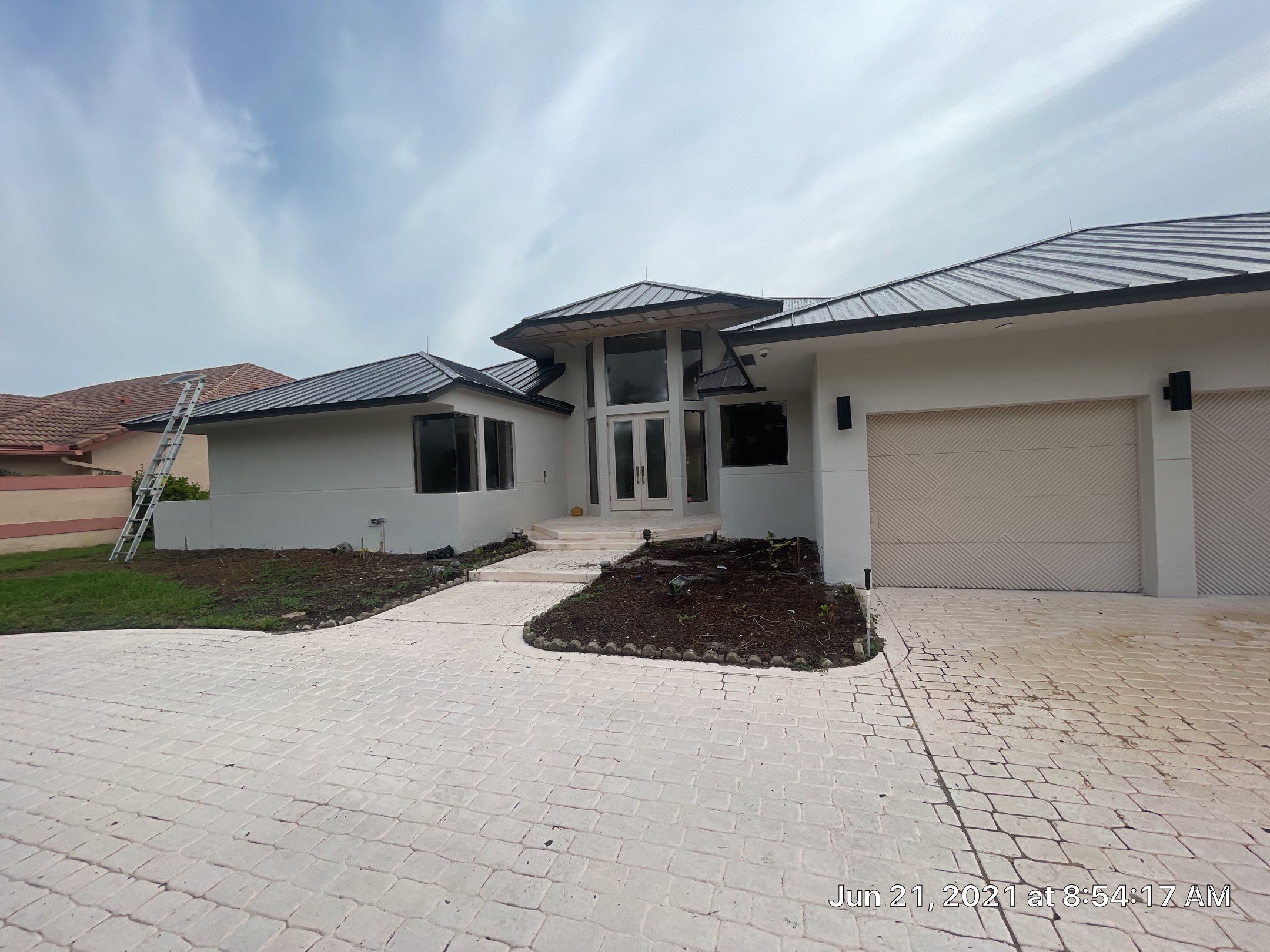Residential Roofing Installation using 1" Nail strip metal roof by BLUES BROTHERS CONSTRUCTION CORP