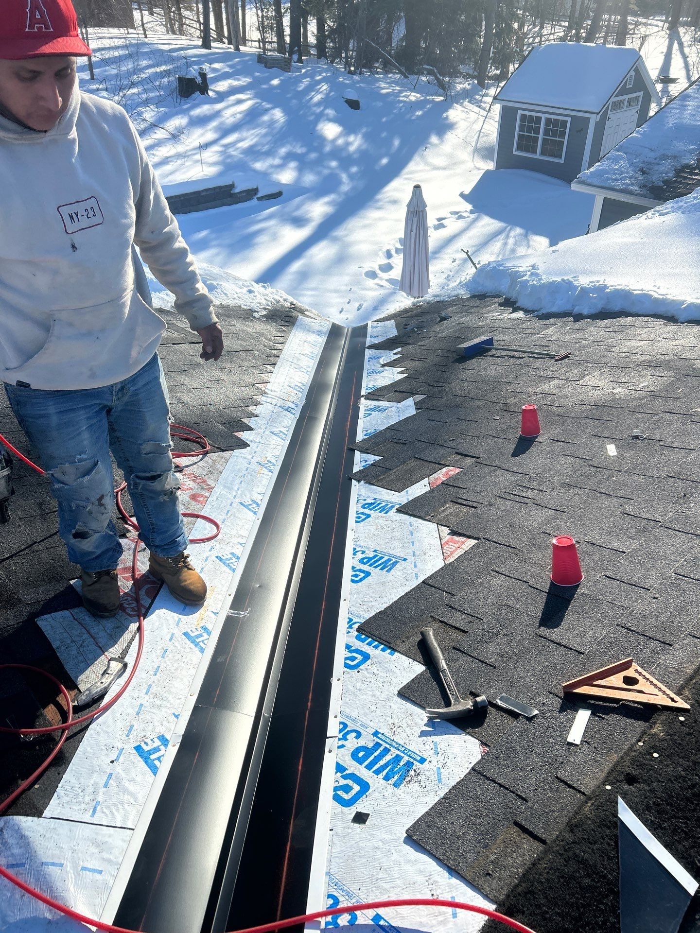 Ridge Cap Replacement & Black Metal Valley Installation in Chelmsford, MA by Mighty Dog Roofing of Greater Middlesex County
