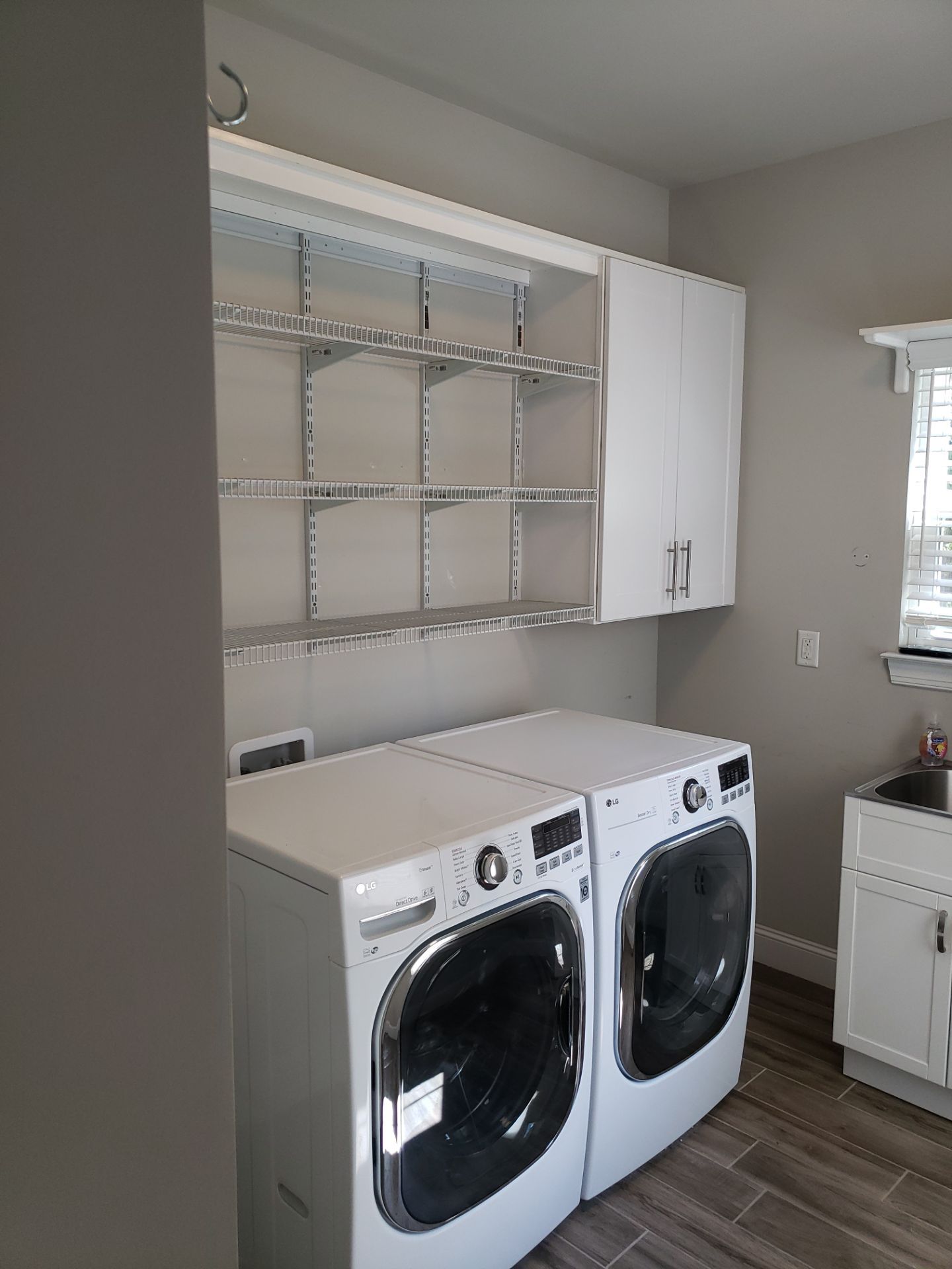 Laundry Room Storage Transformed! by A Step Above Handy LLC