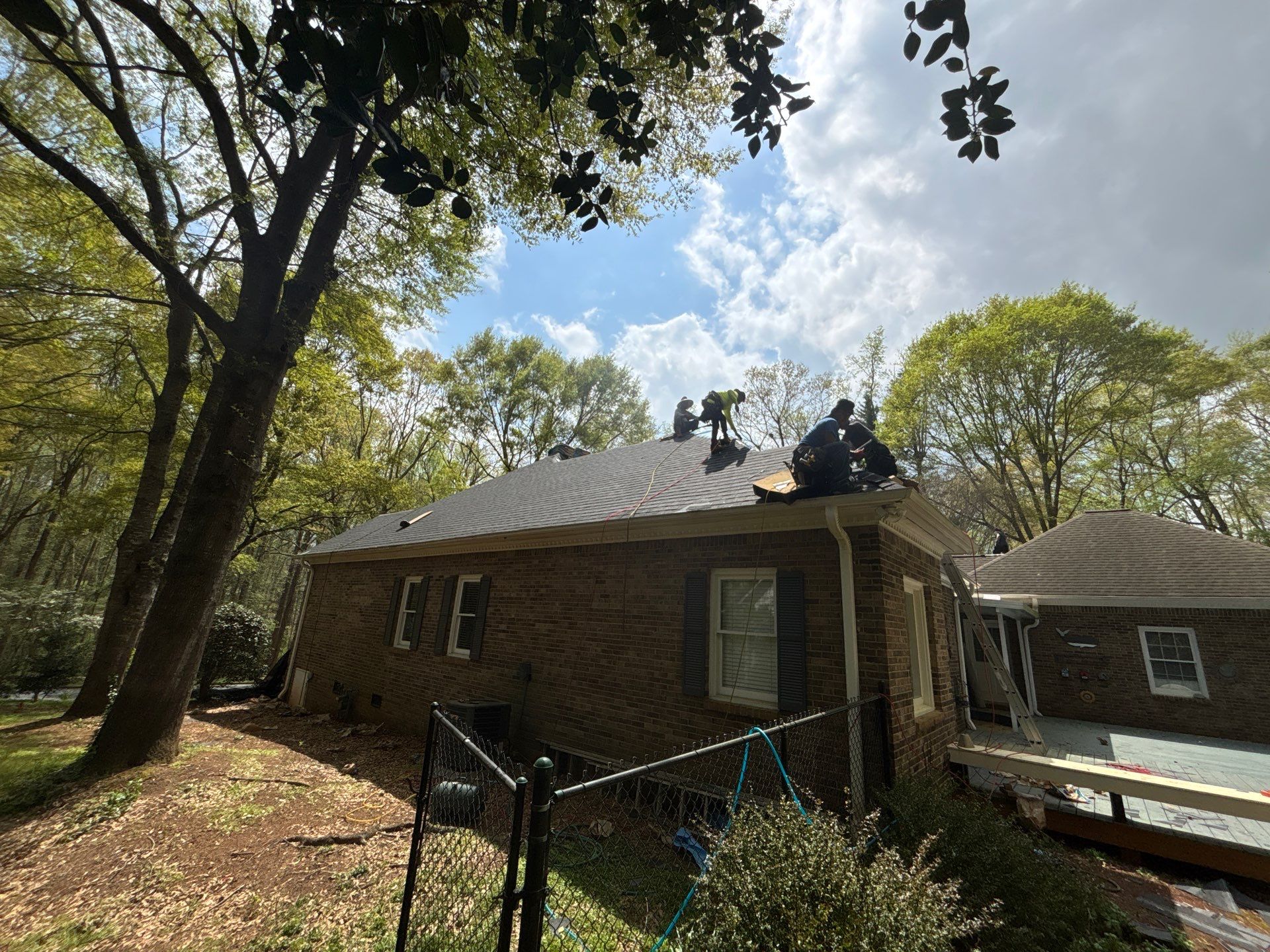 Spartanburg Residential Roof Replacement with Architectural Shingles and Skylights by Roofers LLC