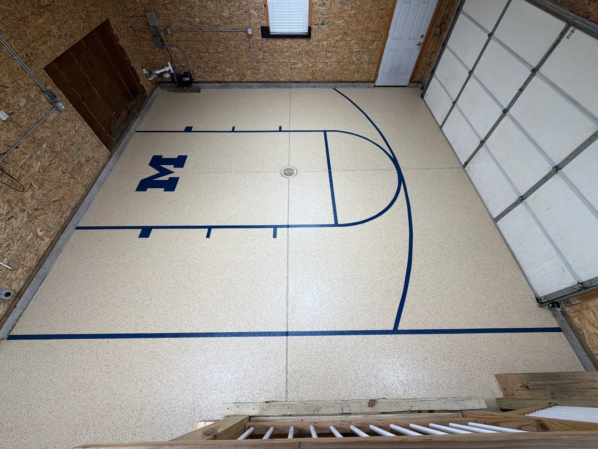 Custom Epoxy Garage Floor Completed In Norton Shores Michigan by Gordon Painting