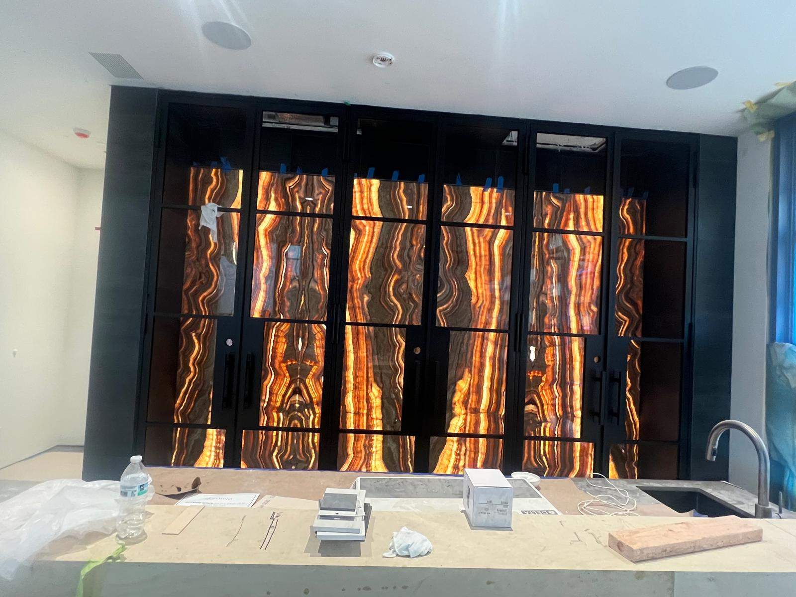 Custom Black-Framed Glass Wine Cellar Installation in Dallas by Solara Custom Living