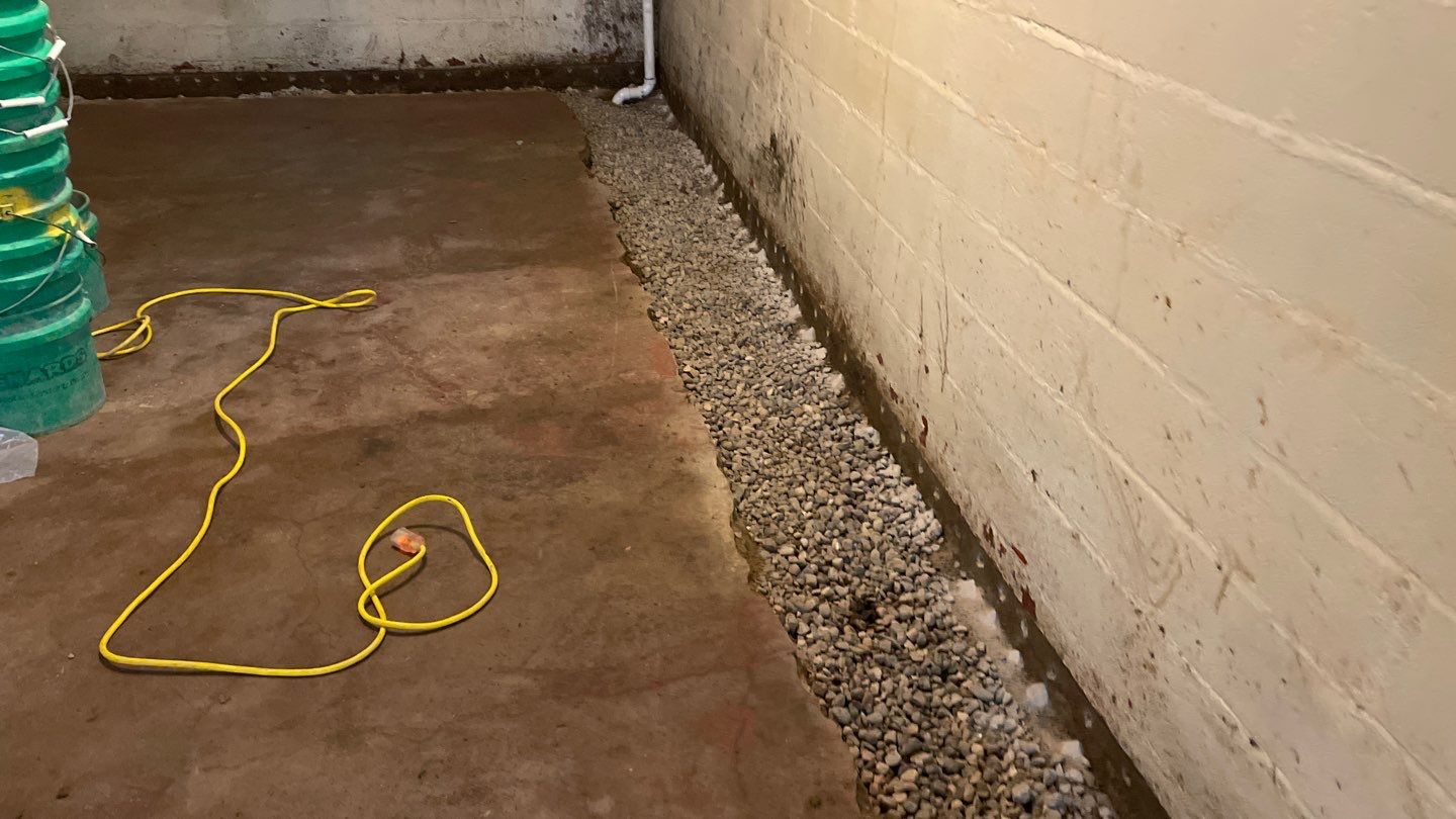 Interior Drain Tile & Sump Pump System in North Minneapolis by Waterproofing Northeast