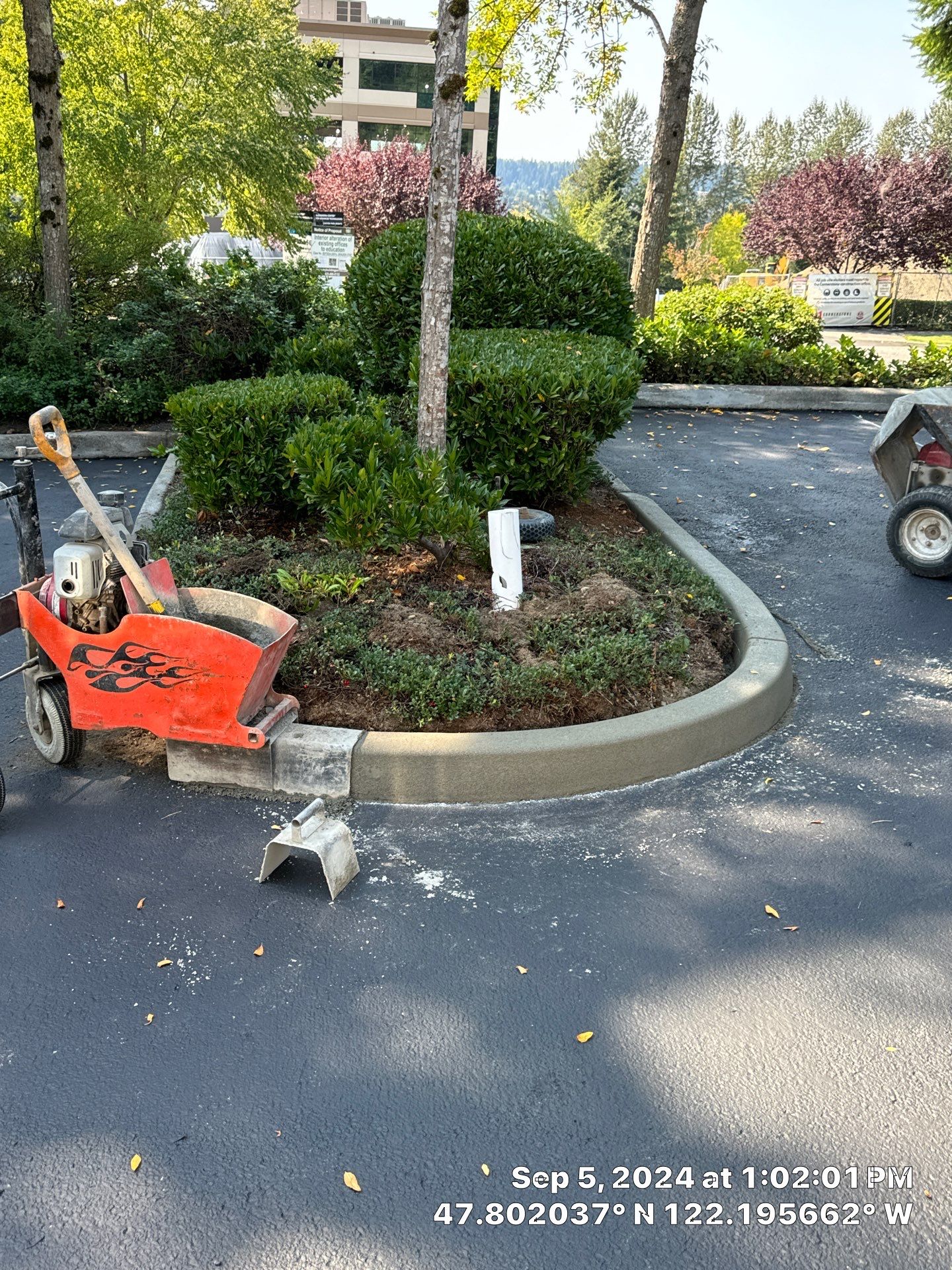 Kidder Matthews | Parking Lot Sealcoating & Striping with Concrete Curb & Patch Repairs  by Jireh Asphalt & Concrete Inc 