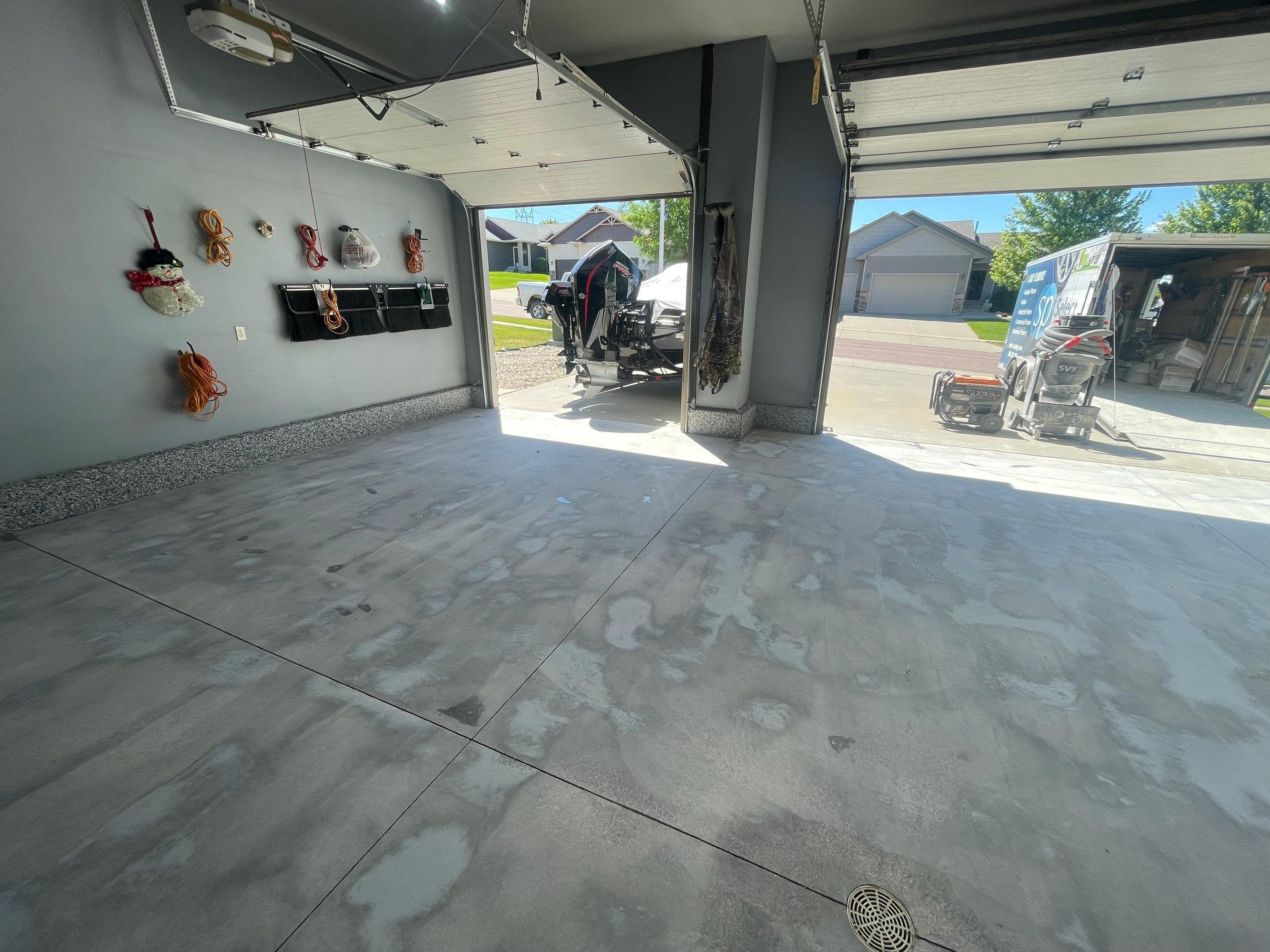 Residential Garage Floor Coating in Sioux Falls by Select Painting, Coatings & Garage Cabinets