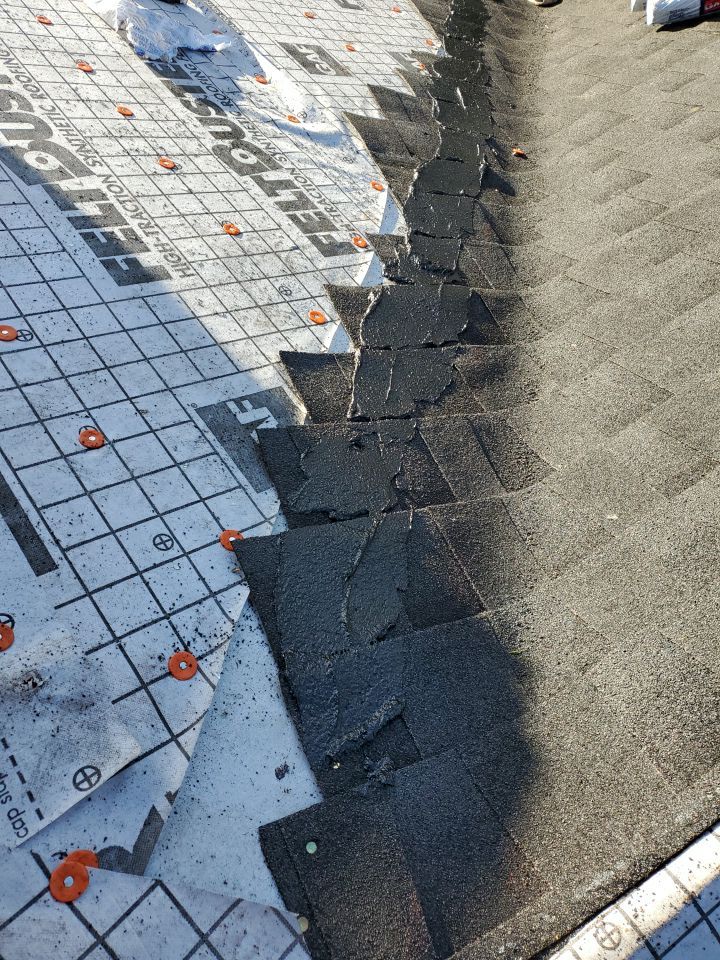 Residential Roofing Installation using Roof Replacement by American Roofing & Construction LLC