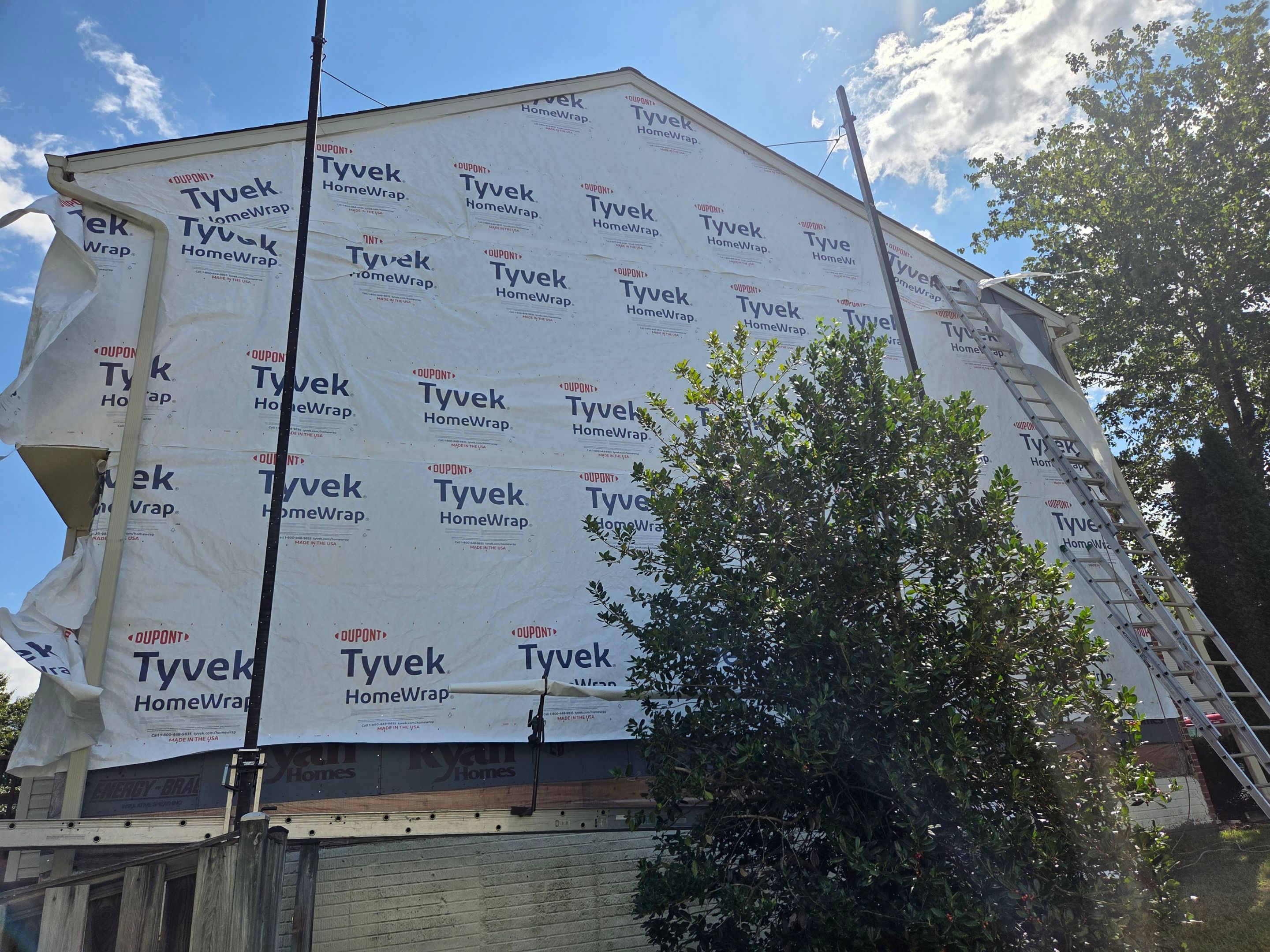 Woodbridge: Siding Replacement with Mastic Ovation Vinyl siding in Linen  by RM Banning, Inc.