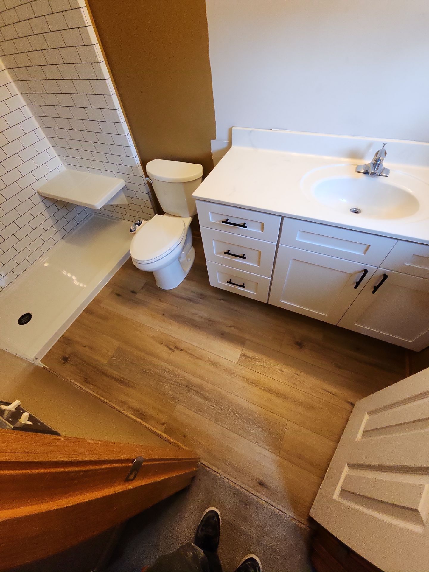 Bathroom Remodel using Luxury Vinyl Plank by The Shower Company