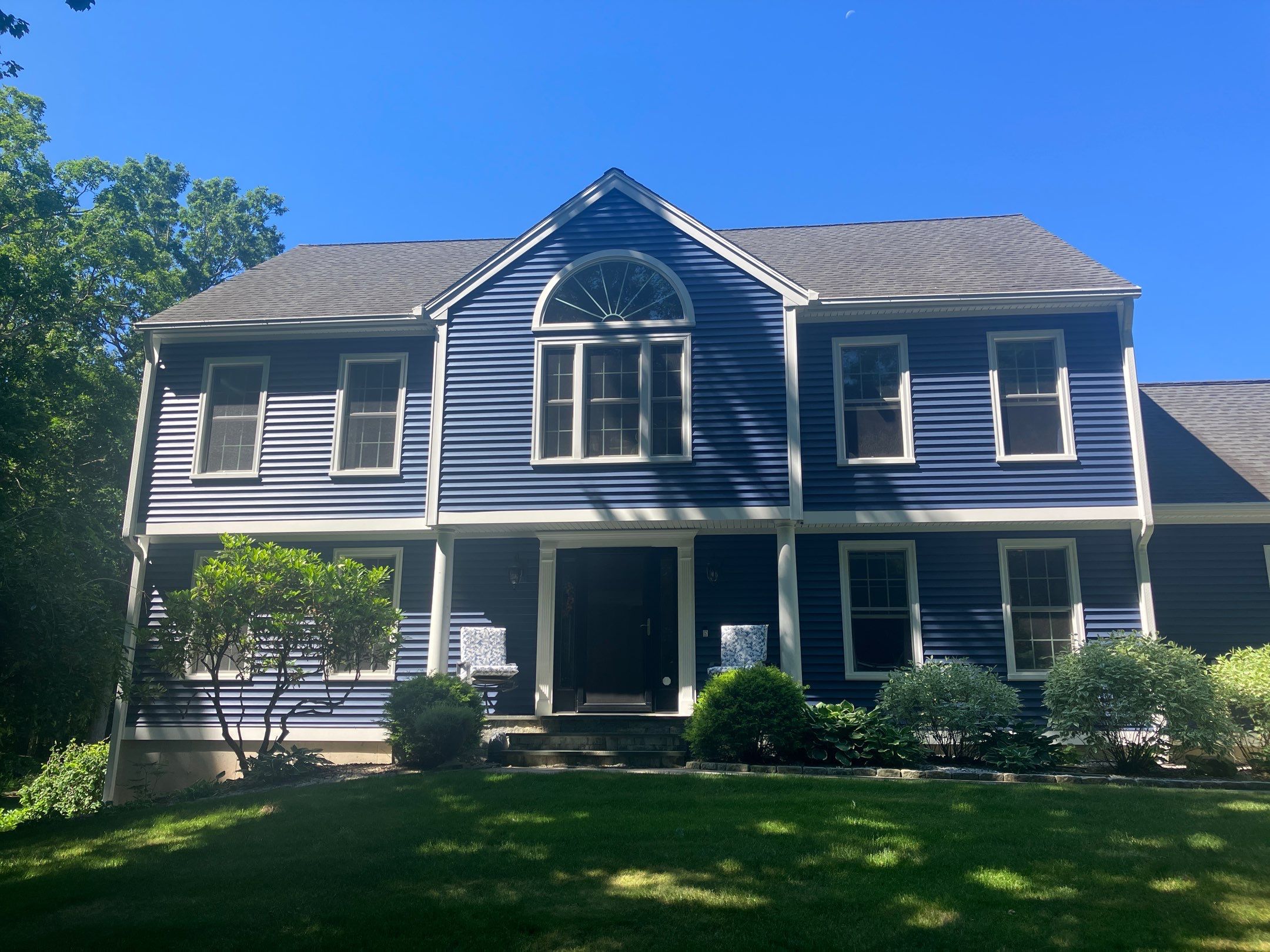 Siding facelift with Cert Monogram D/4 x16'8" clapboard, Midnight Blue & Cert Monogram D4x25' clapboard, Midnight Blue by DiGiorgi Roofing and Siding Inc
