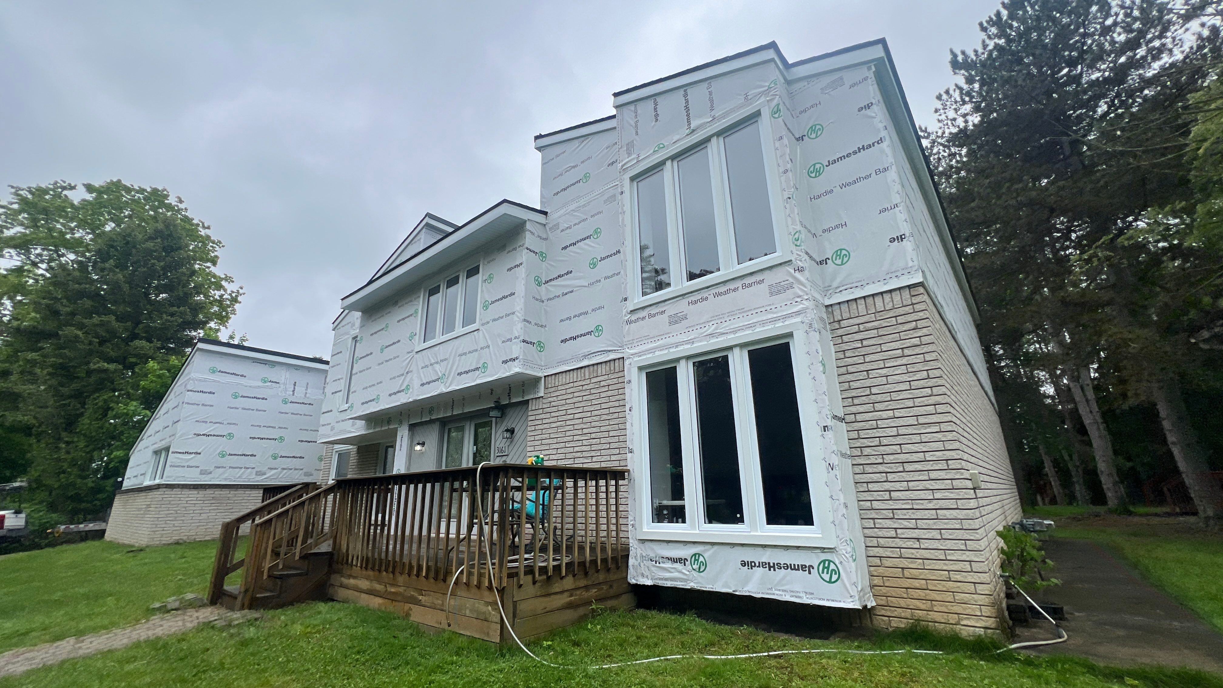 James Hardie Siding Replacement by Bloomfield Construction & Restoration