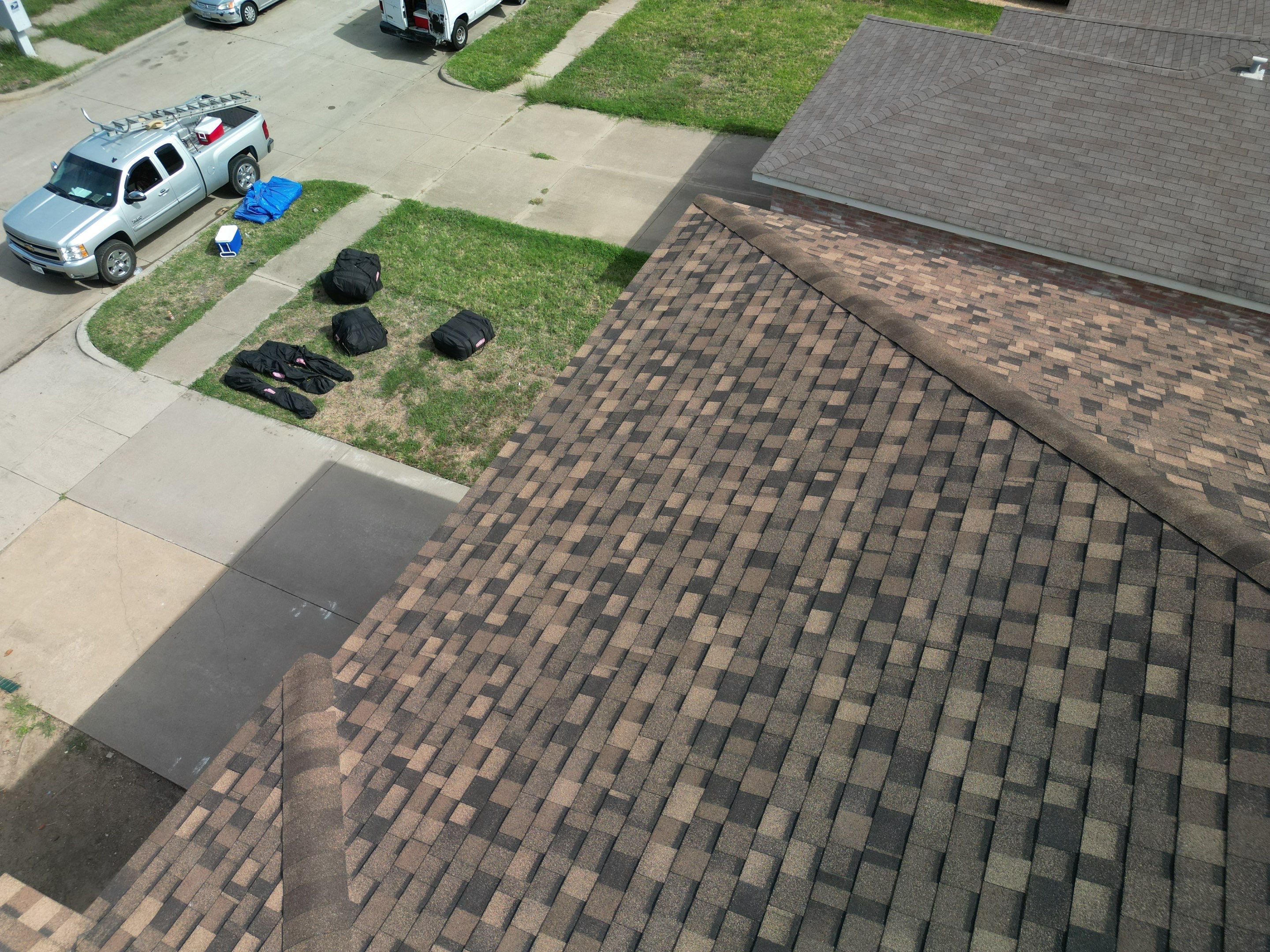 Full Roof Replacement, Chimney Rebuild and Interior Damage Replacement by First United Roofing & Construction