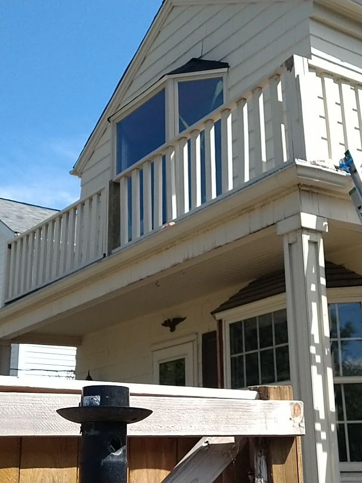 Residential Roofing Installation, Dec-tek walk-out porch roof, siding on garage by Absolute Roofing and Construction