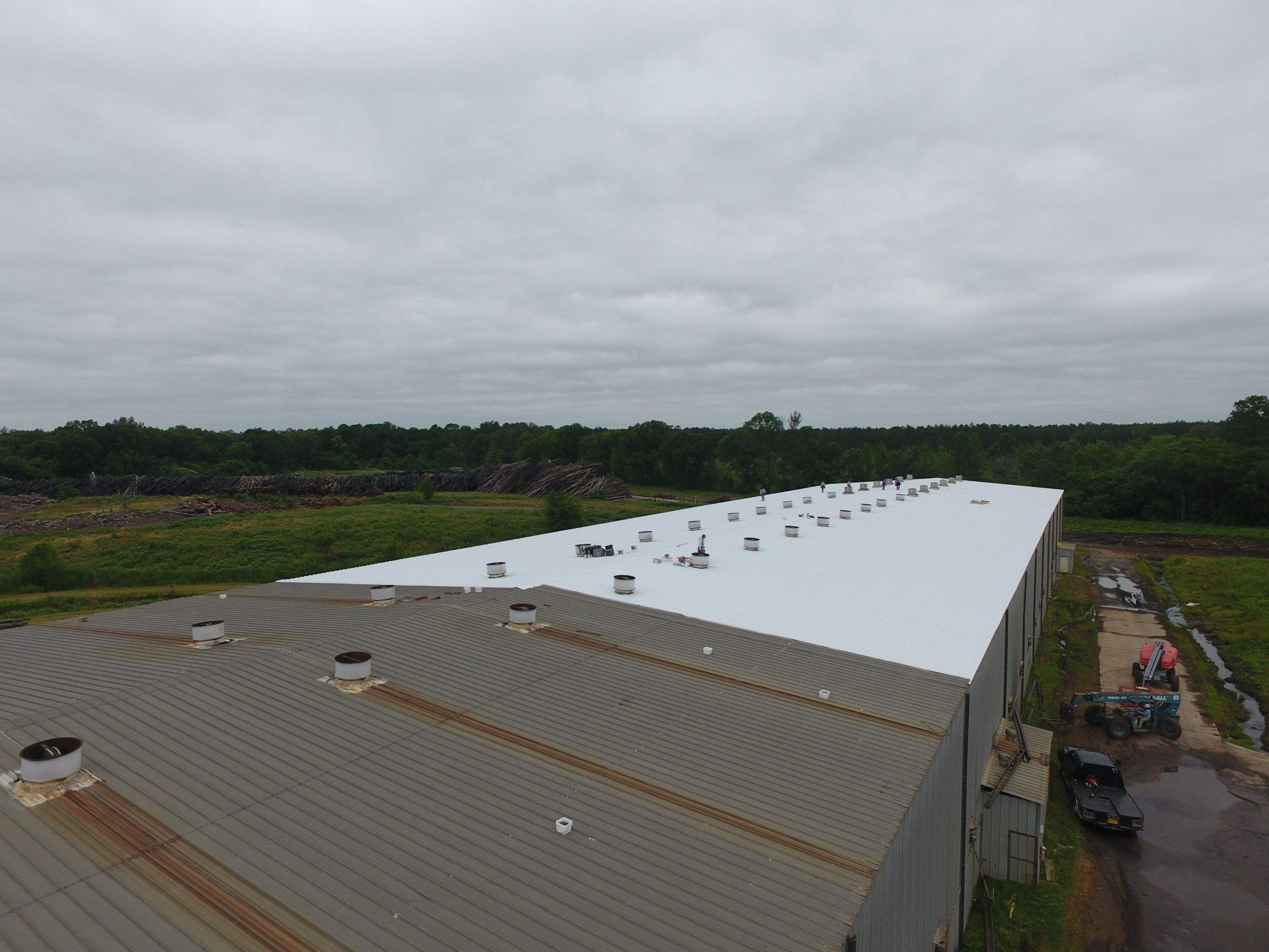 Commercial Roofing Installation using Aluminum Roofing panels by Hostetler Roofing