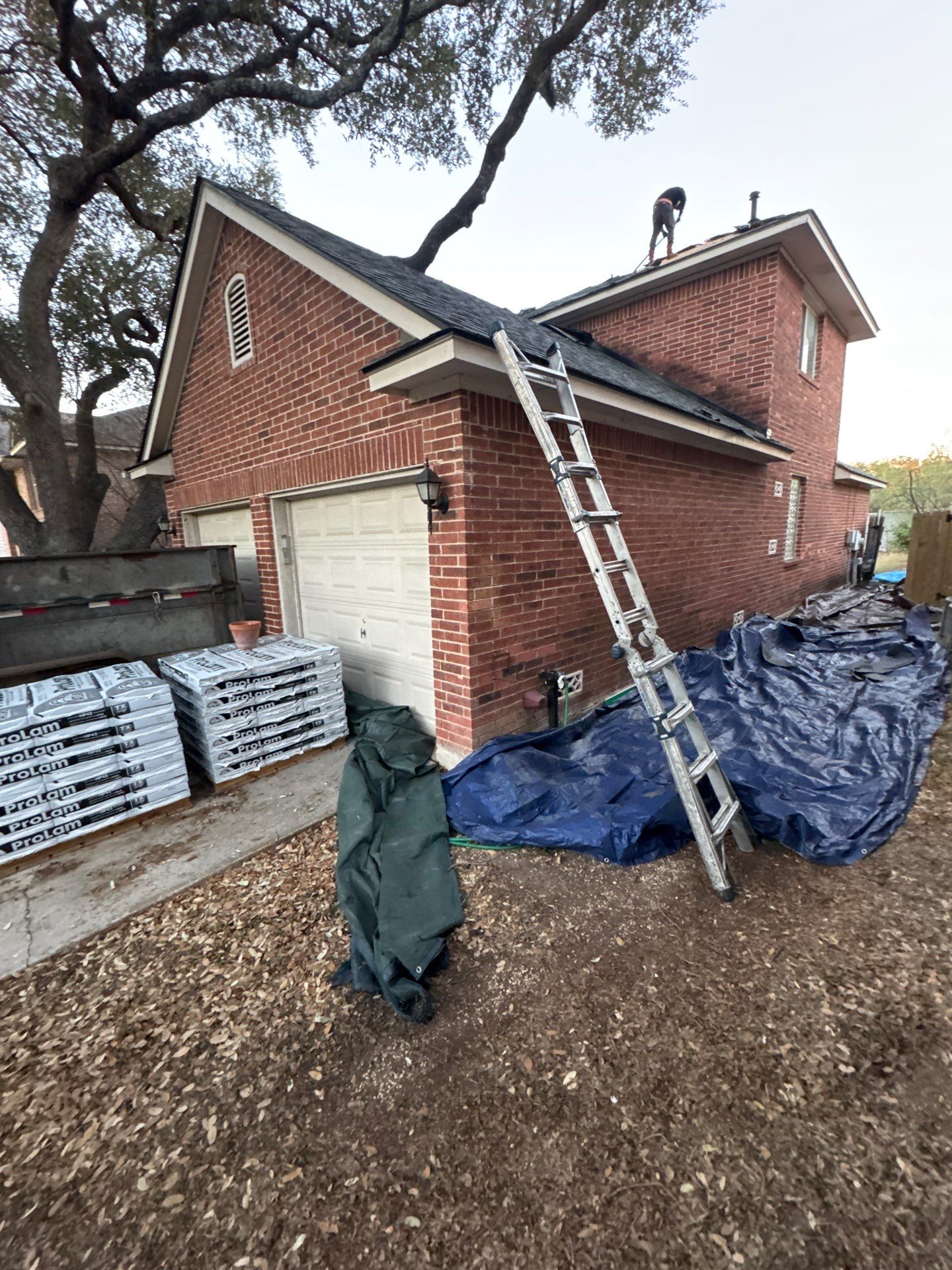 Residential Roof Replacement using ATLAS PROLAM WEATHER WOOD by Elite Roofing LLC