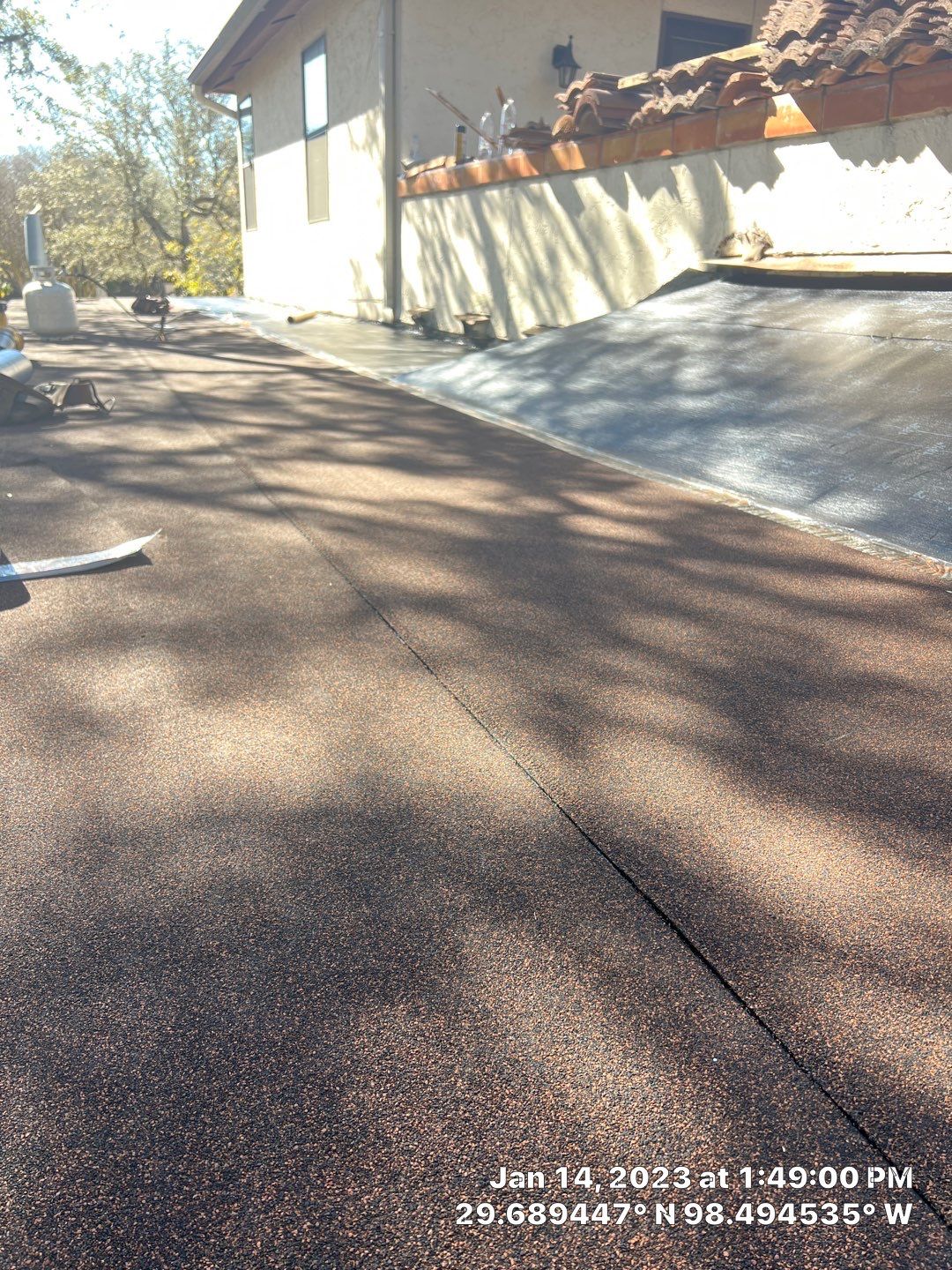 Residential Flat Roof Replacement using Mulehide Modified Bitumen Roofing by Premier Roofing and Contracting