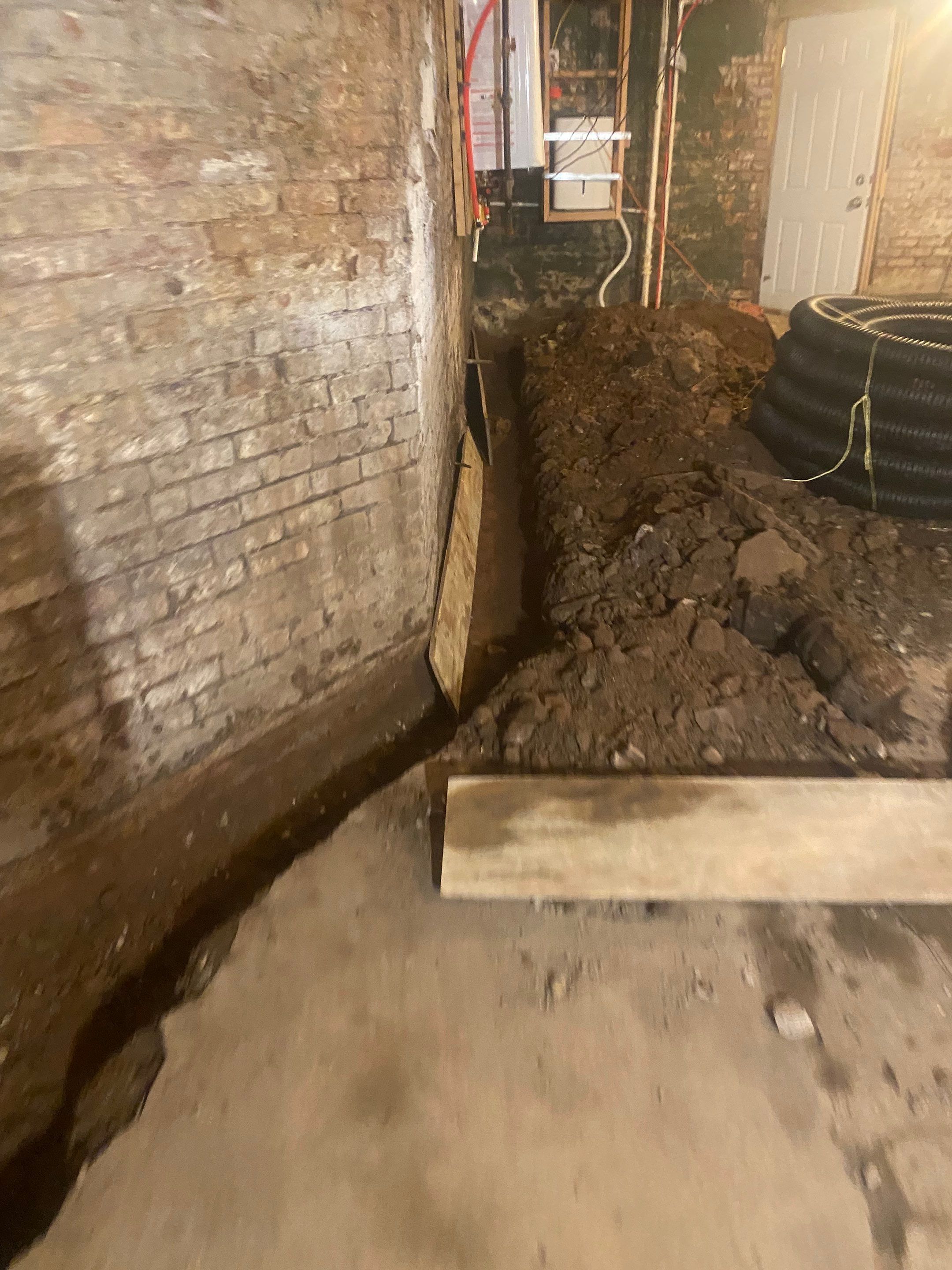 Interior French Drain & Wall Vapor Barrier in Newark, NJ  by Pure Service Pro, LLC 