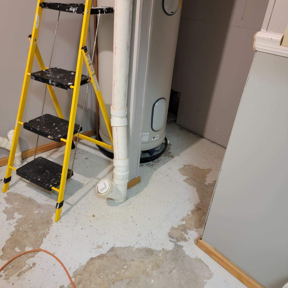 Full Garage and Basement Epoxy Floor Coating in Winner by Select Painting, Coatings & Garage Cabinets