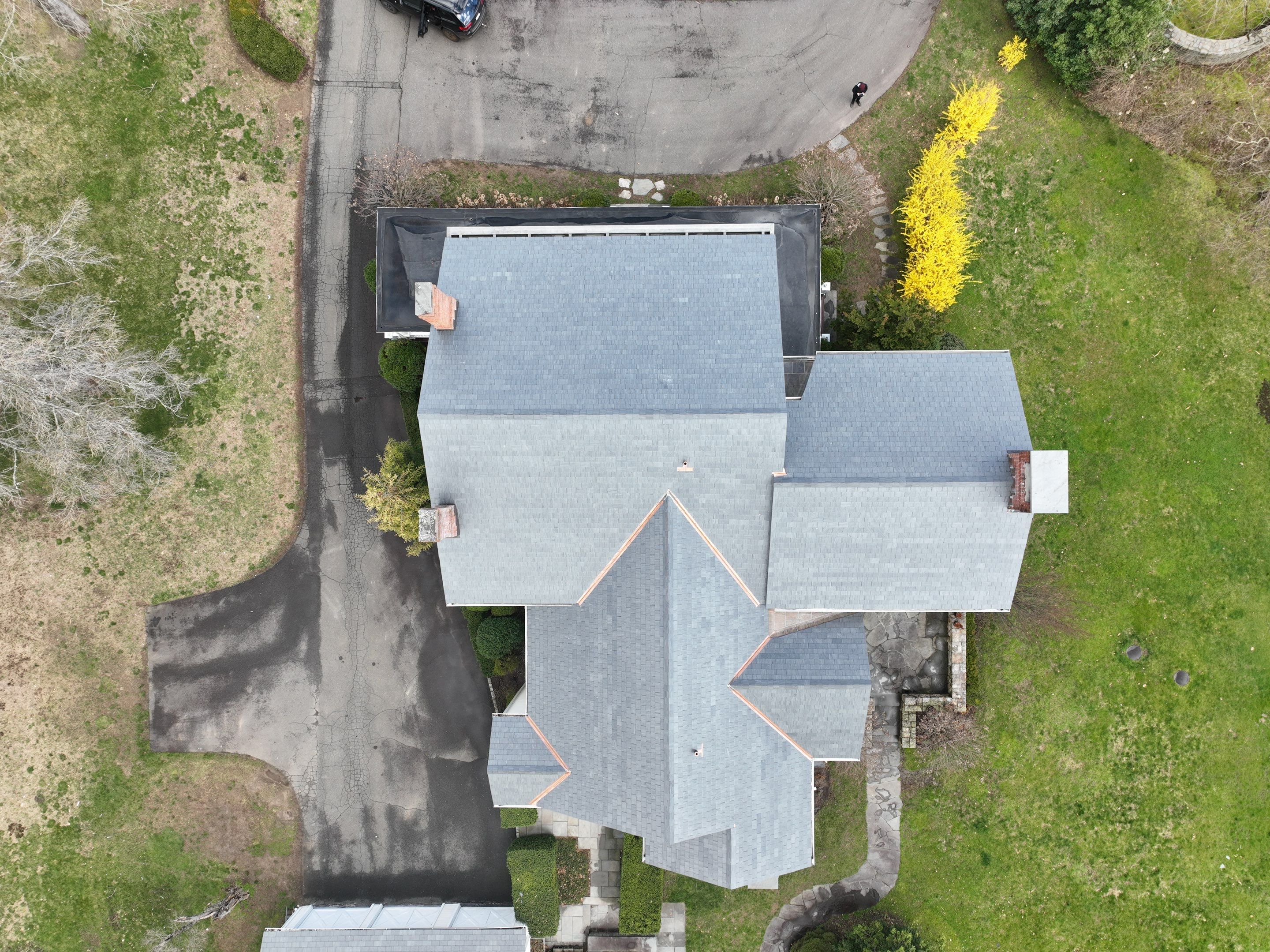 Residential Roofing Installation using Vermont Slate by A Plus Exterior