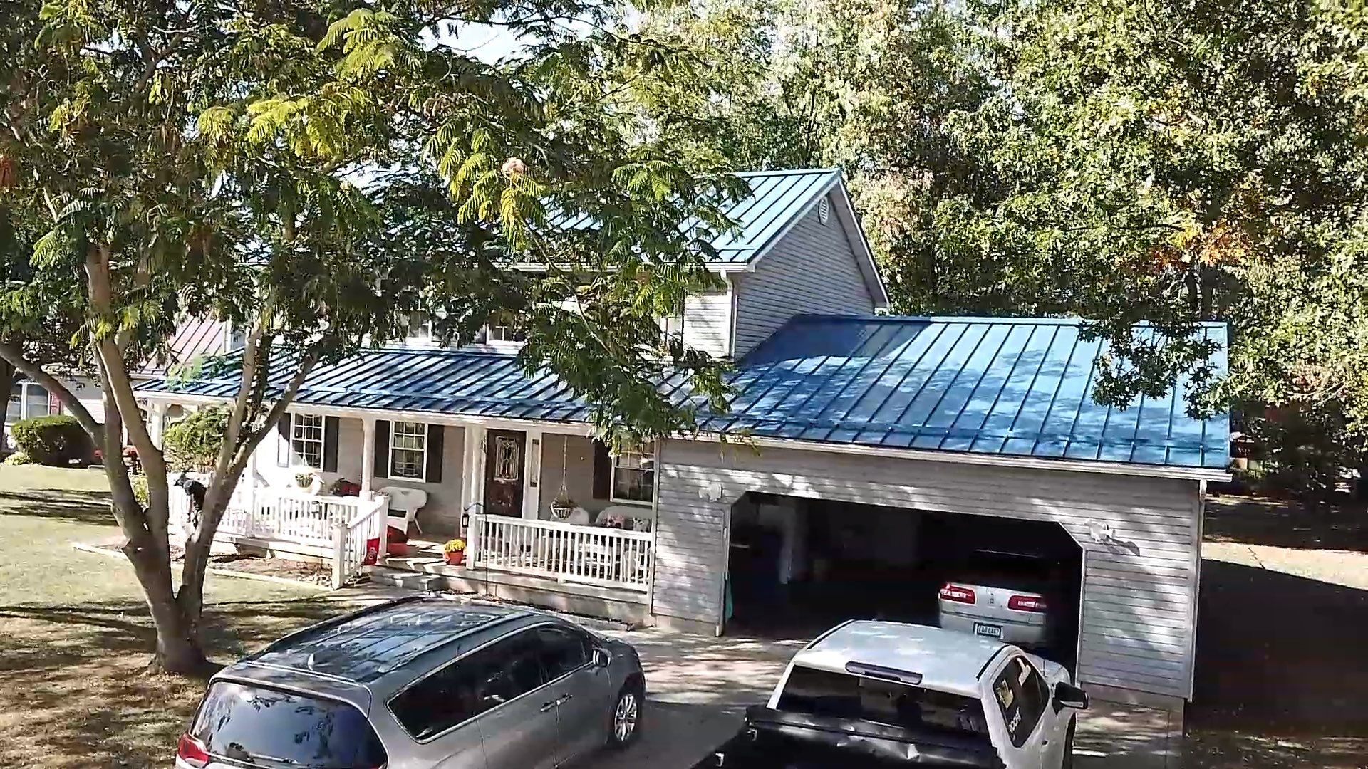 Residential Roofing Installation using Standing Seam Metal - Gallary Blue by RoofX 