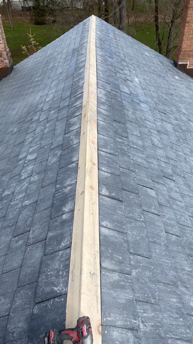Residential Roofing Installation using Vermont Slate by A Plus Exterior