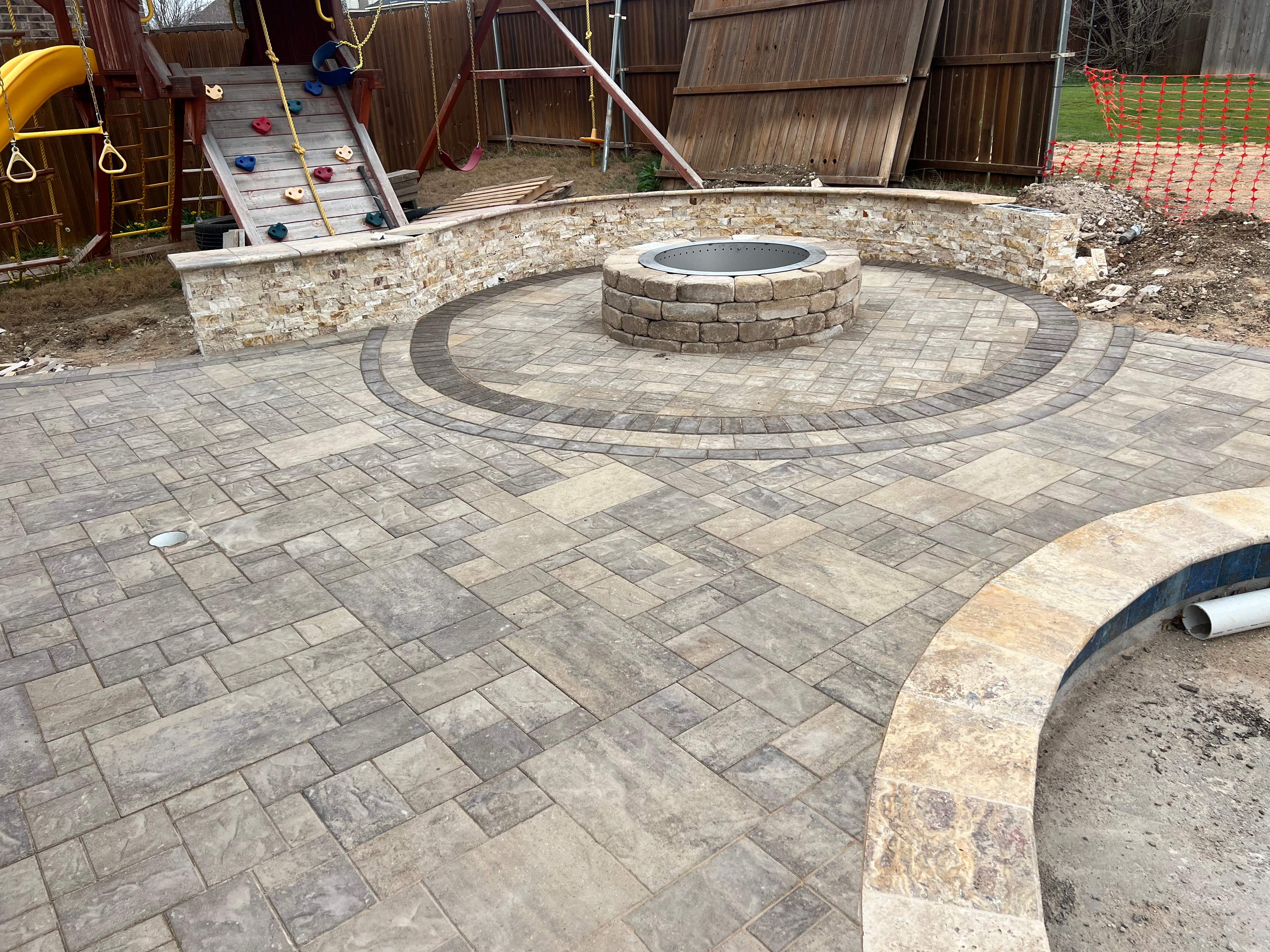 Freeform Pool with Raised Stone Spa by Pinnacle Pools and Spas - DFW
