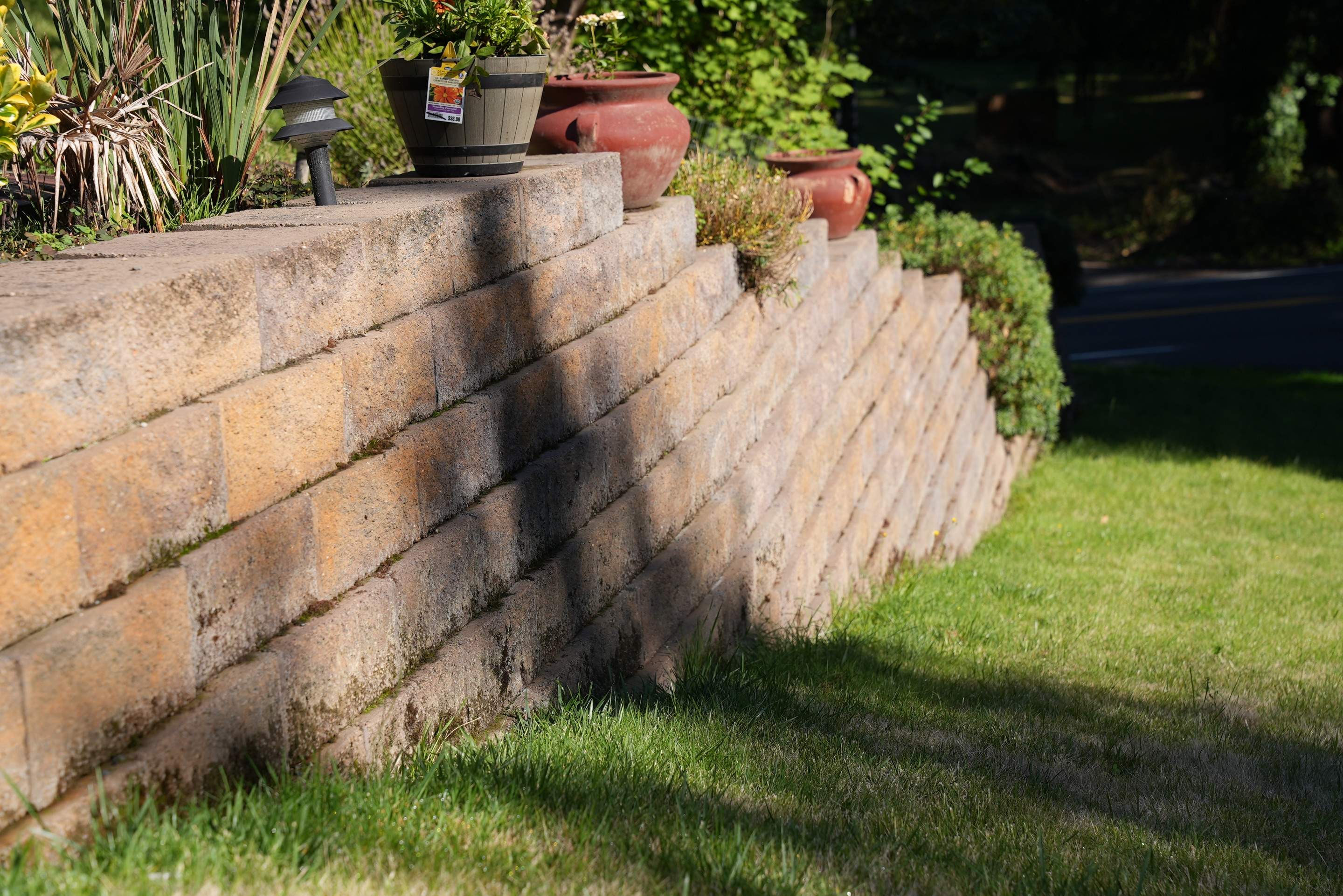 Mehta | Tiled Driveway with Sealer & Retaining Wall  by Jireh Asphalt & Concrete Inc 