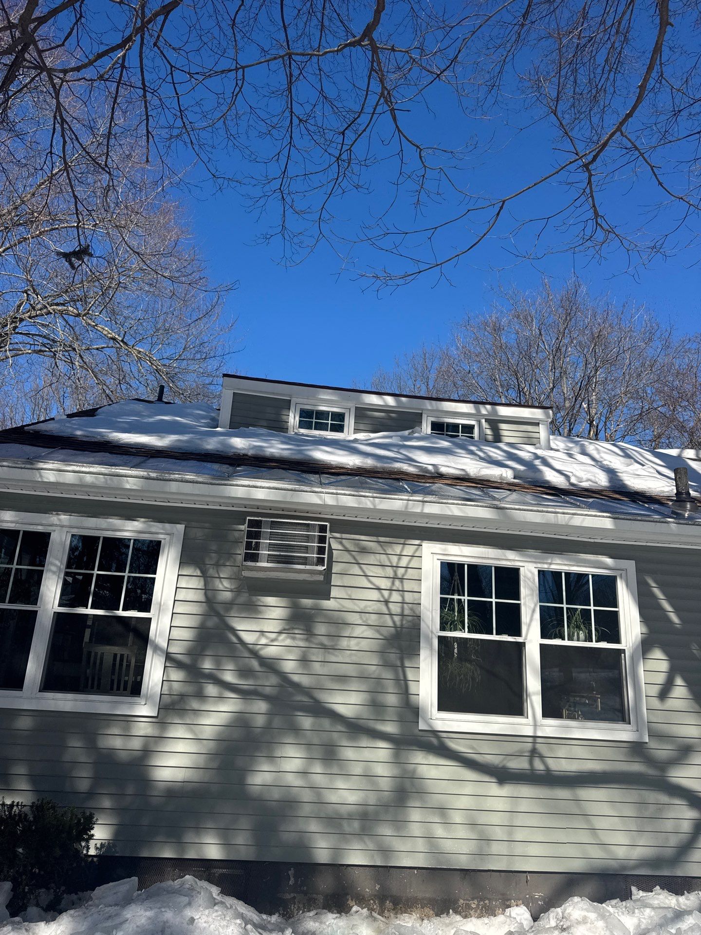 Snow/Ice Belt & Ice Dam Removal Project in Woburn by Mighty Dog Roofing of Greater Middlesex County